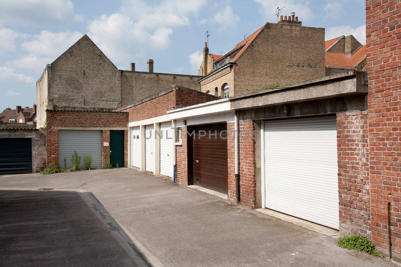 Garage doors at the backside of the houses in Bergues, France