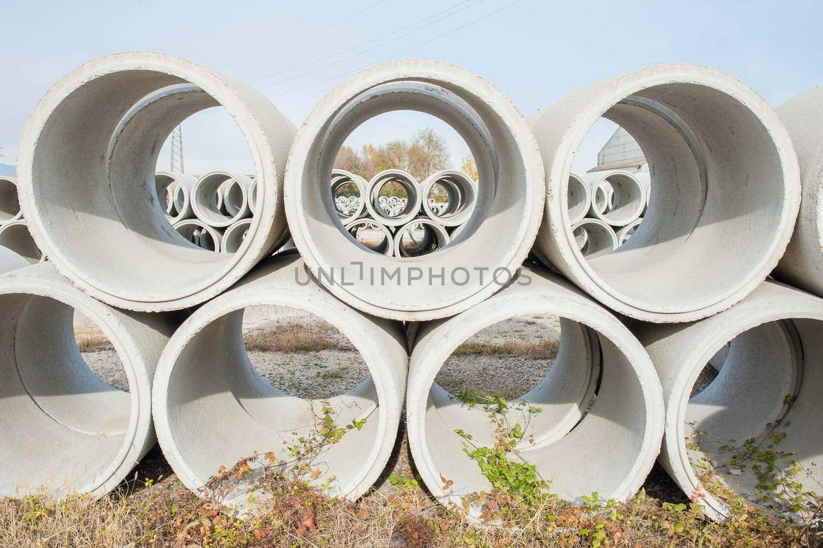 Concrete drainage pipes for industrial building construction.