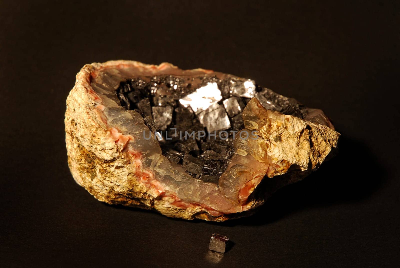 Pyrite stone on a dark background