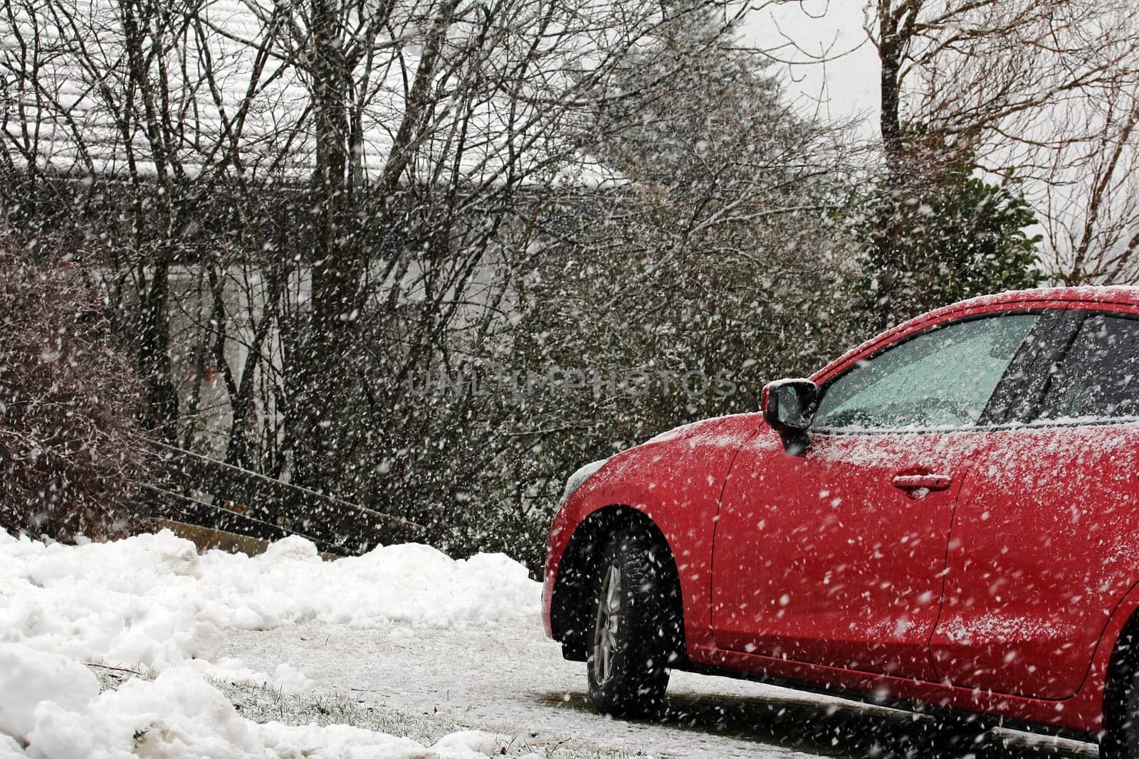 Winter road traffic. Heavy snowfall is dangerous for motorists