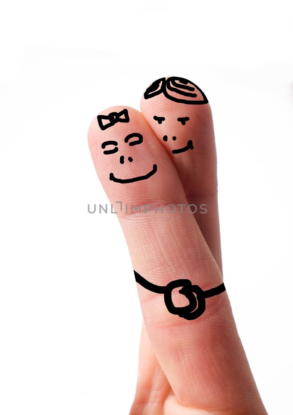 Two fingers on white, couple in love symbol