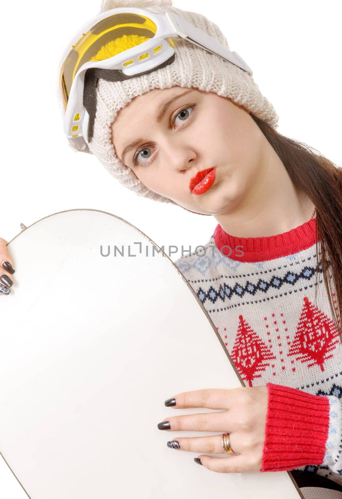 a beautiful woman with a snowboard in studio