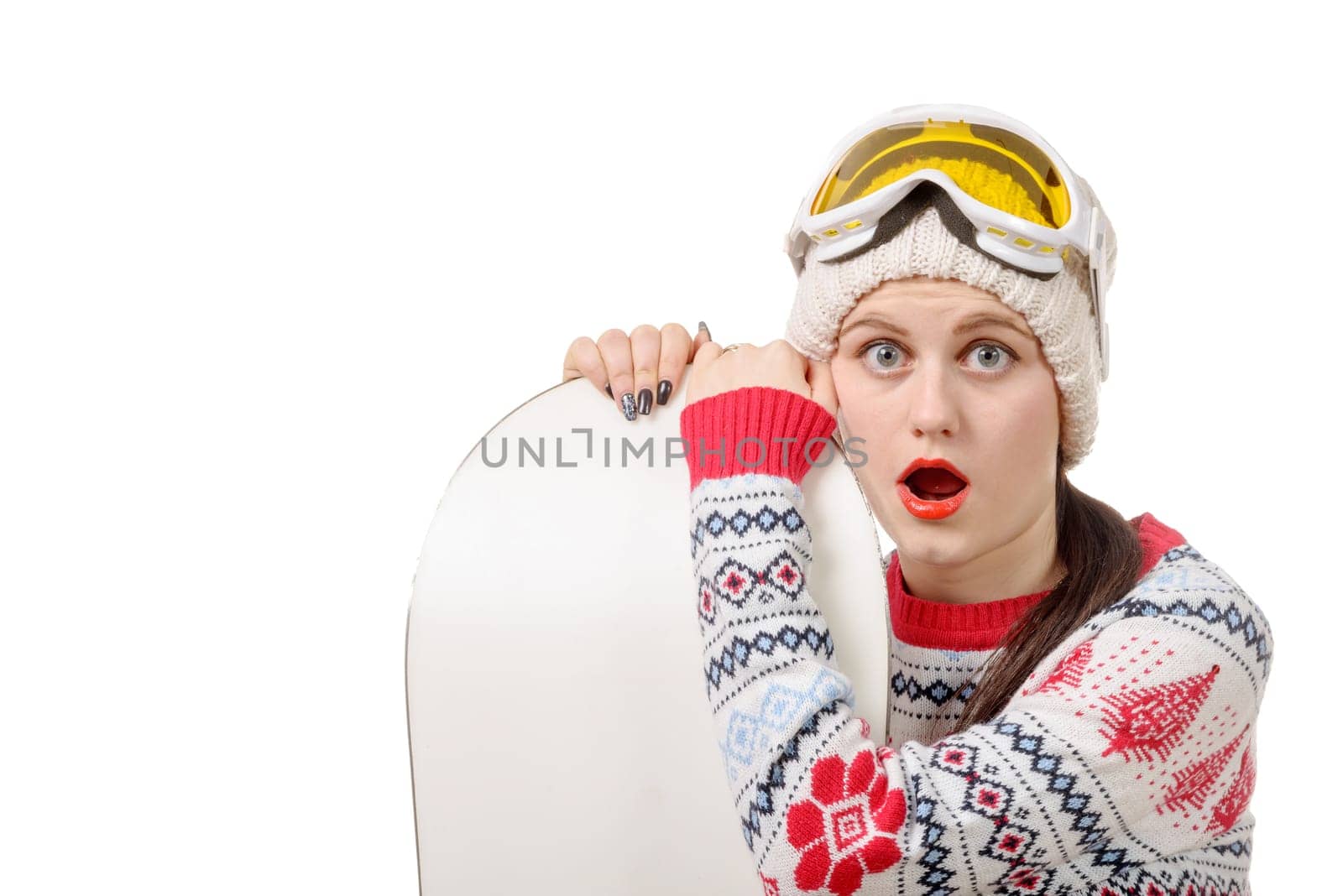 a beautiful woman with a snowboard in studio