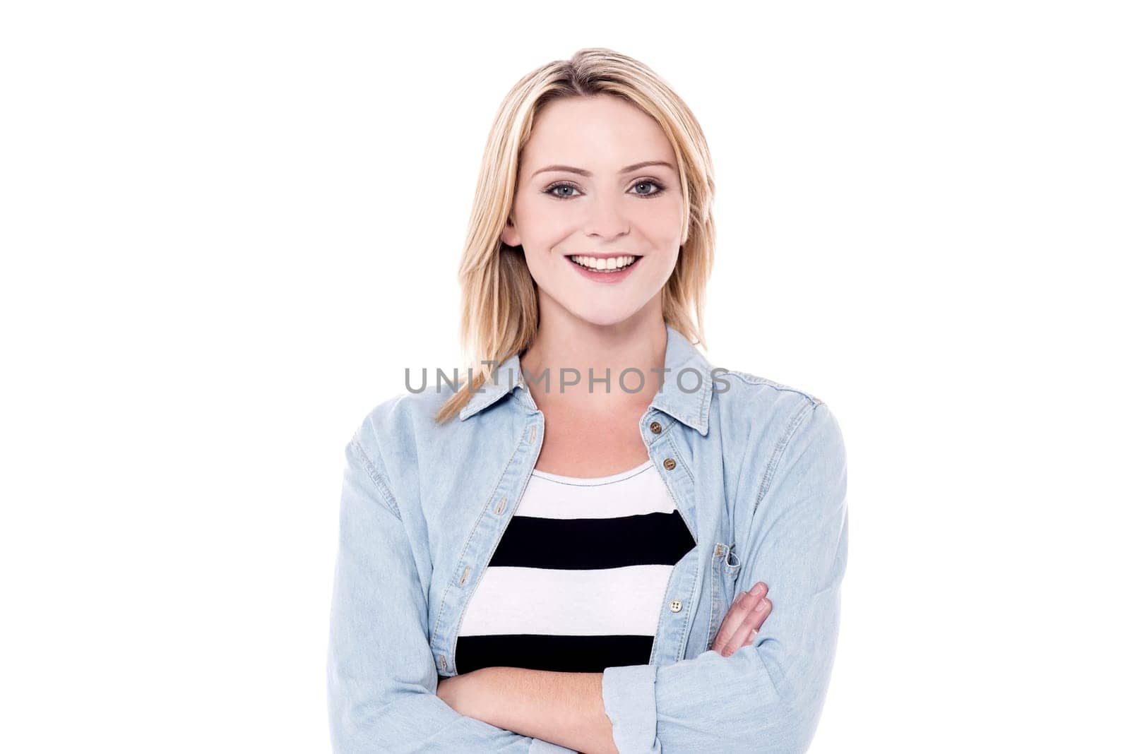 Casual woman with crossed arms over white