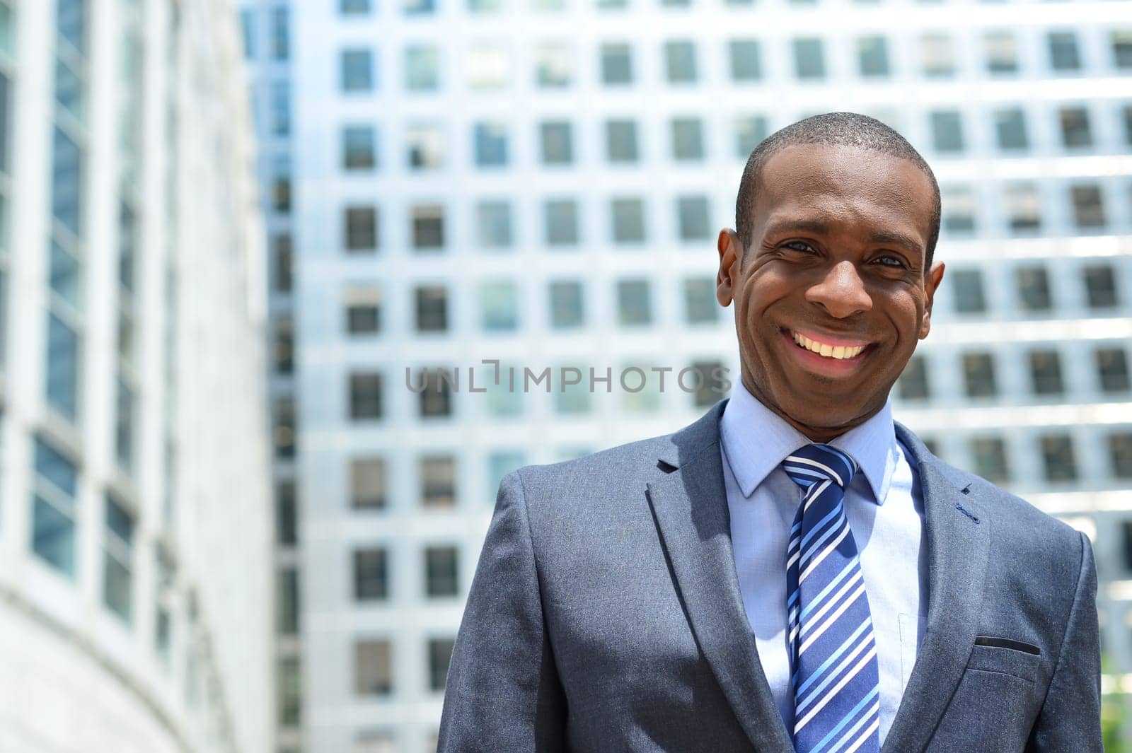 Picture of a business man outside his office