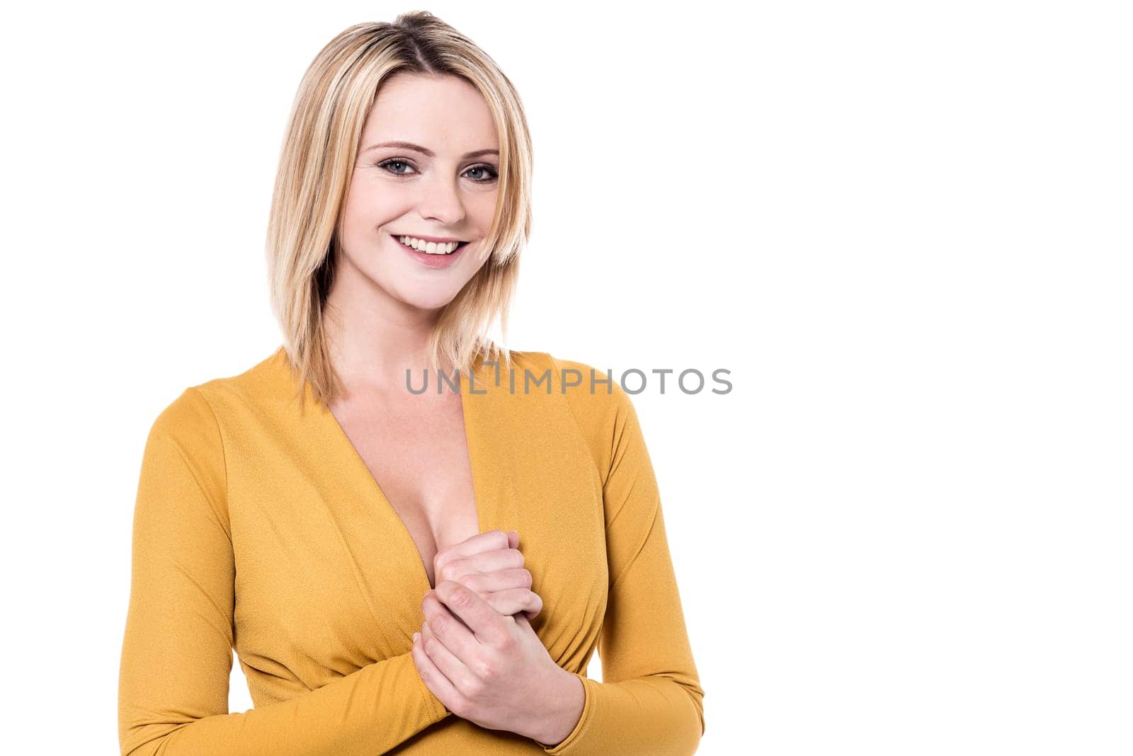 Smiling woman posing to camera in trendy costume