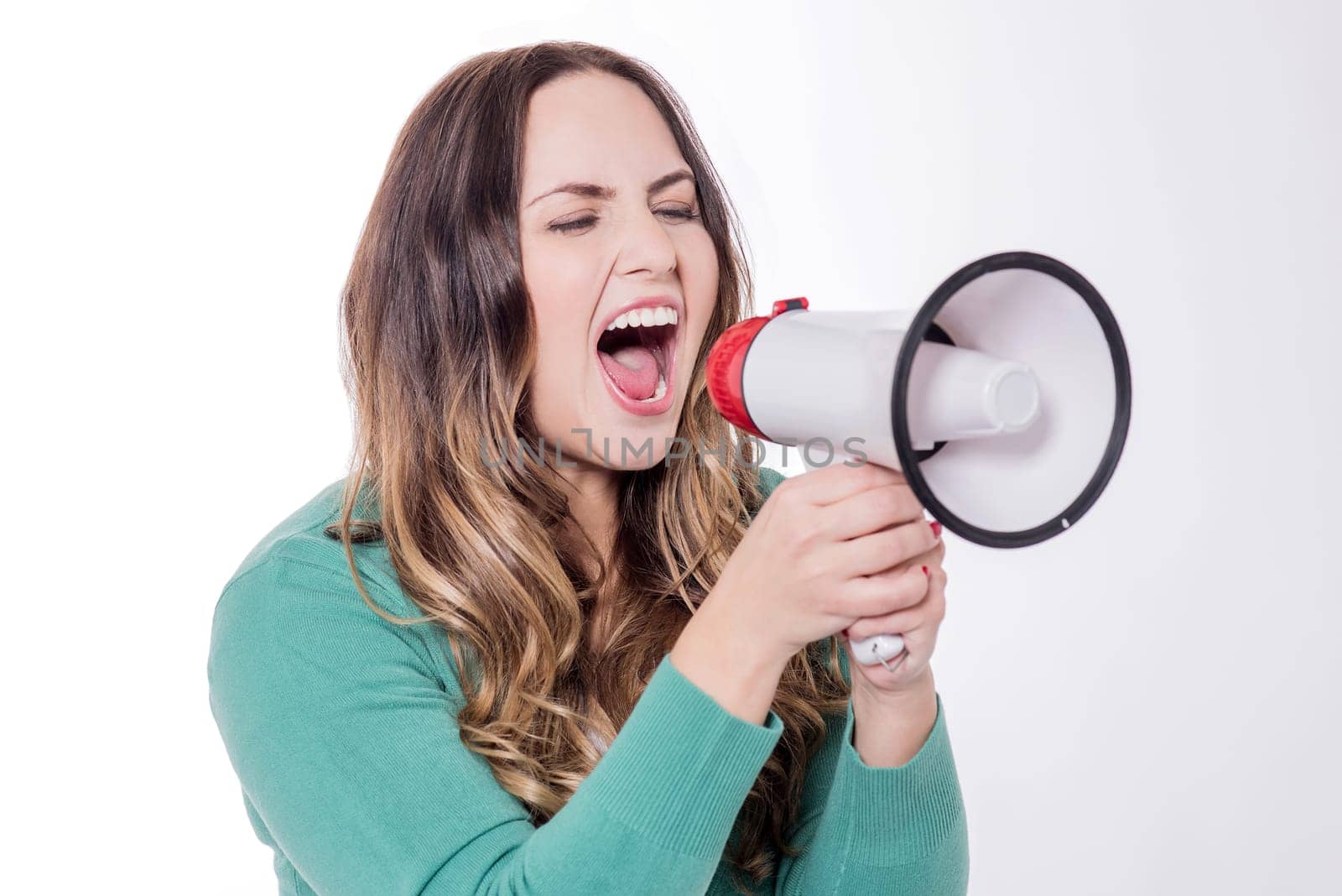 Woman screaming on a megaphone, isolated over white