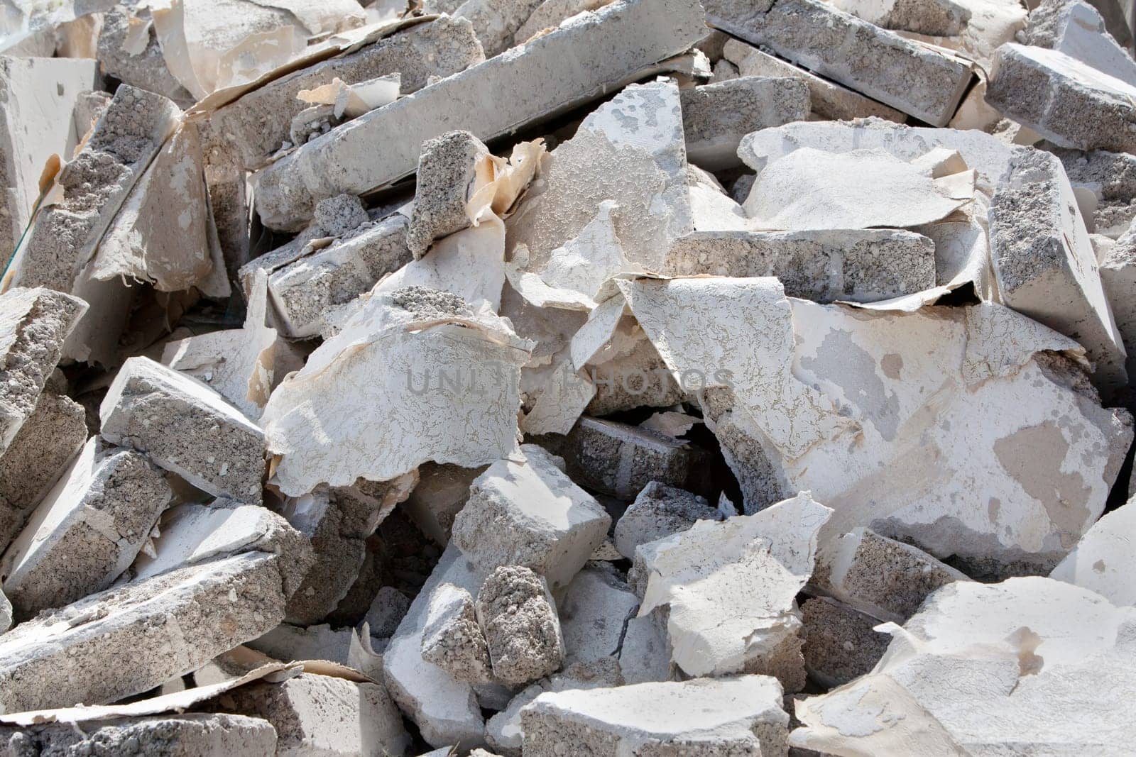 A heap of bricks and stones on a construction site