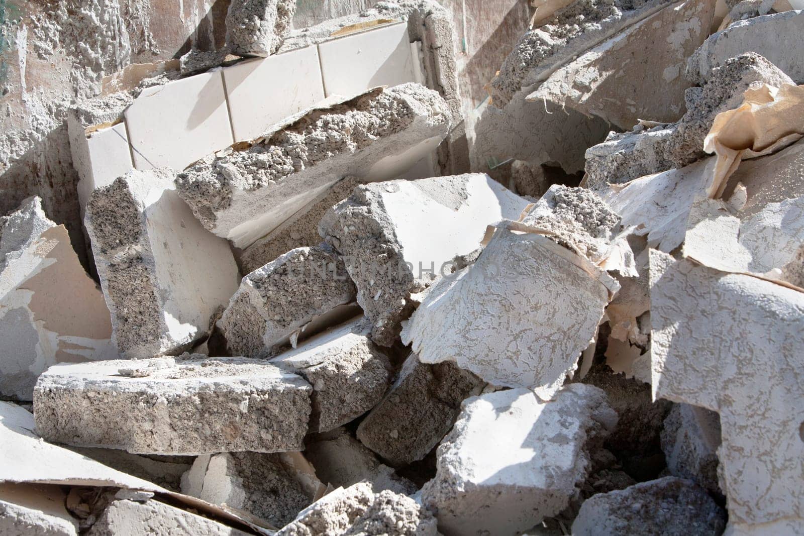 A heap of bricks and stones on a construction site