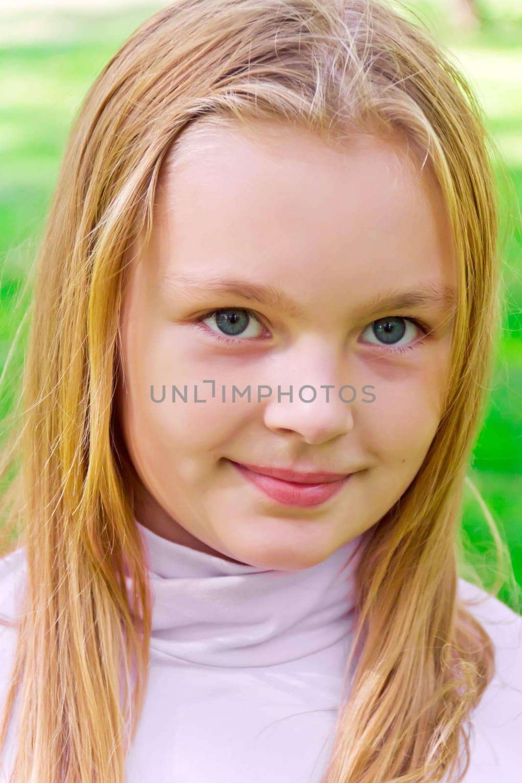 Photo of cute girl with big blue eyes