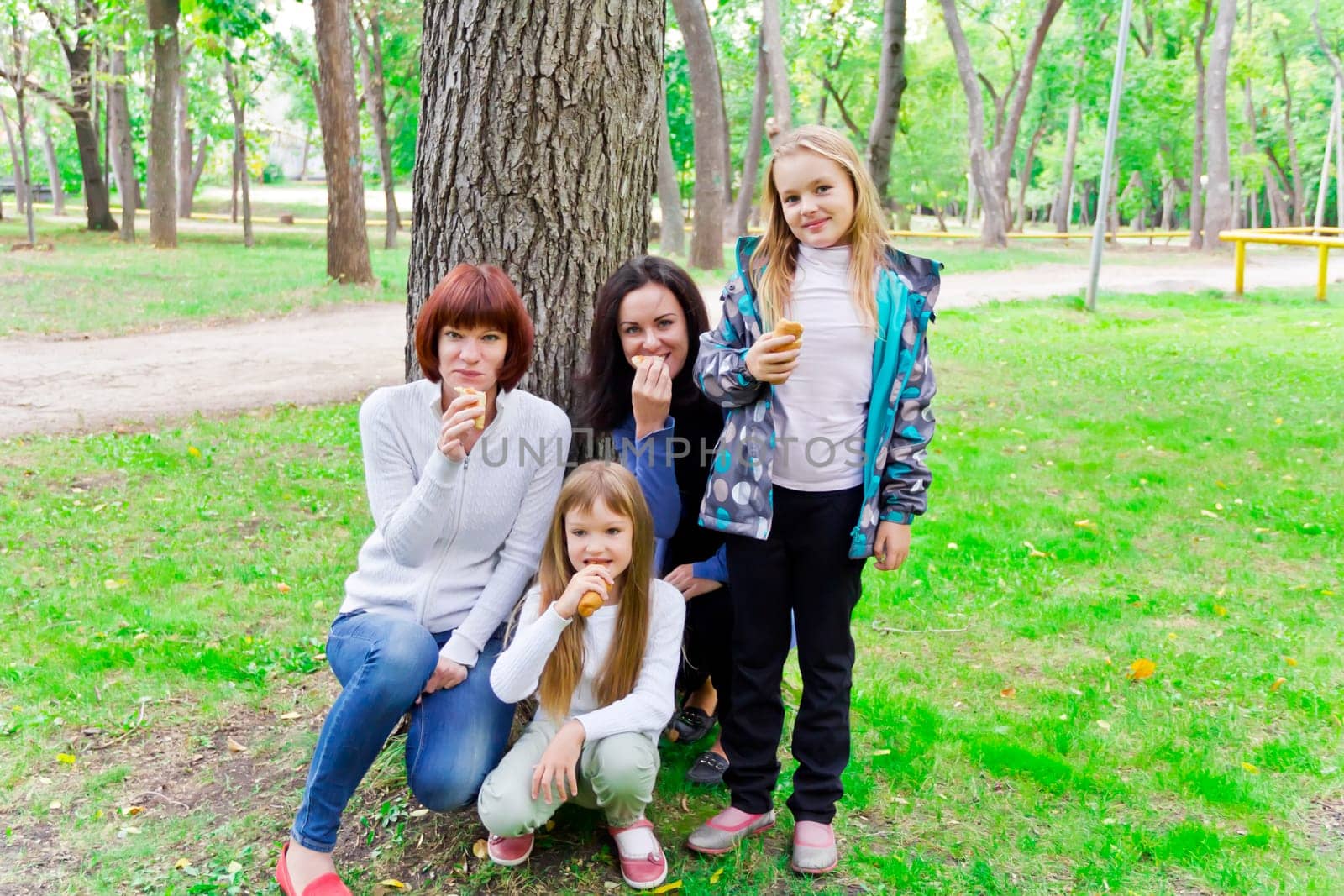 Photo of group people are eating in summer