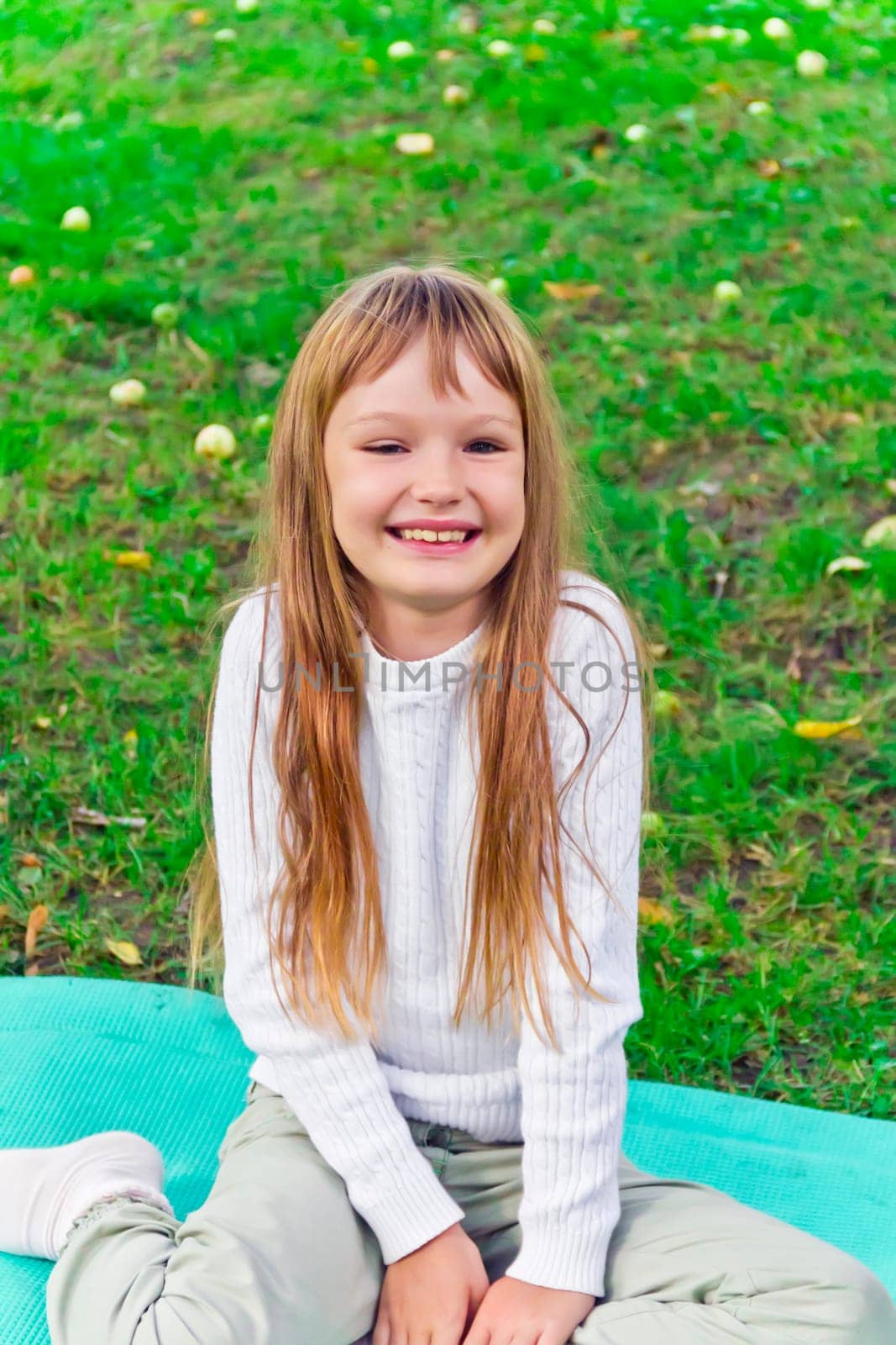 Photo of cute smiling girl with long hair