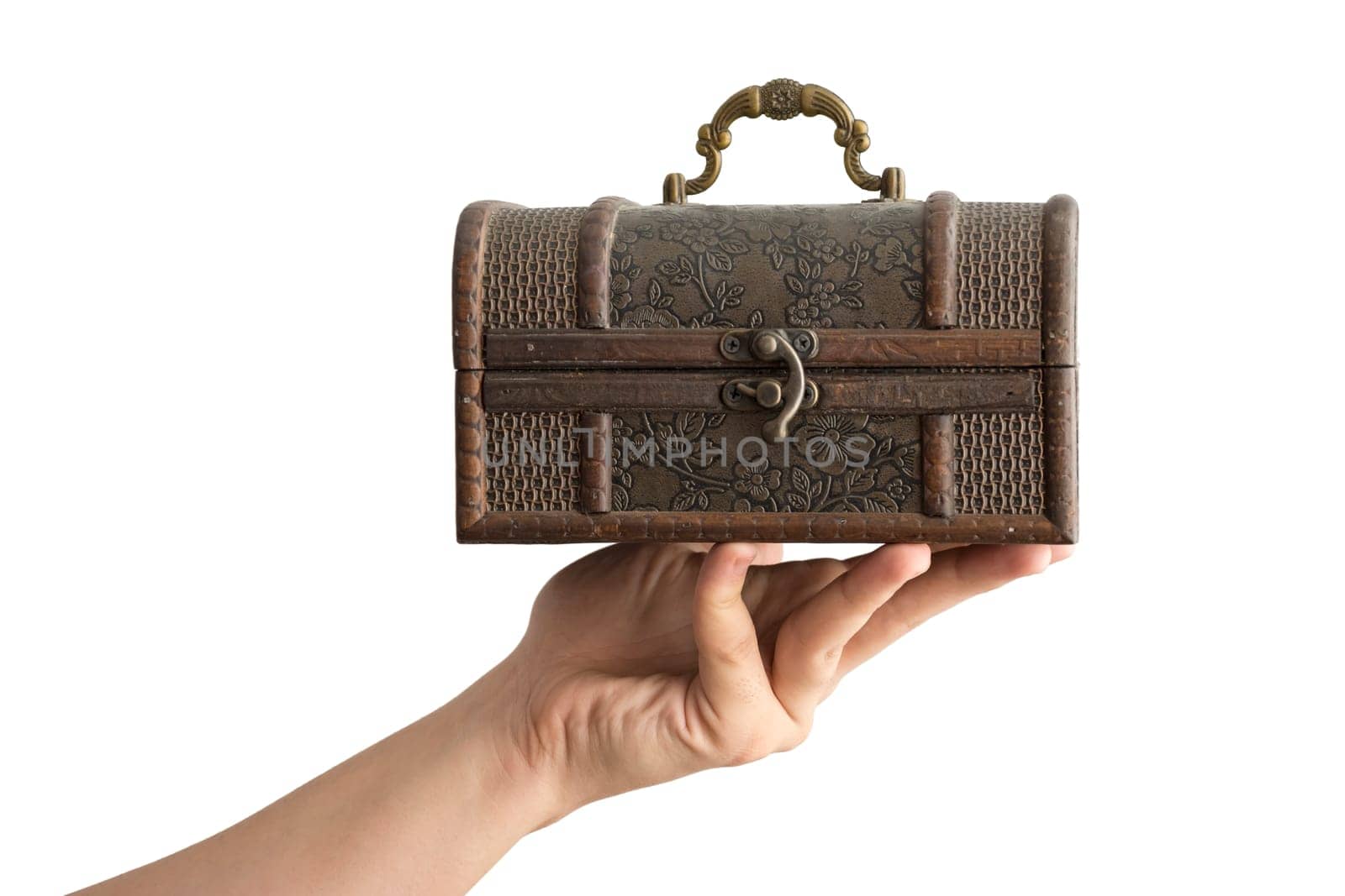 A Hand Holding a Traditional Olden Closed Box isolated on white background