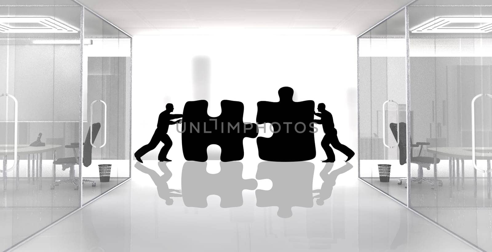 Concept of two workers assembling jigsaw pieces. Two team members are working together in order to achieve the same goal.