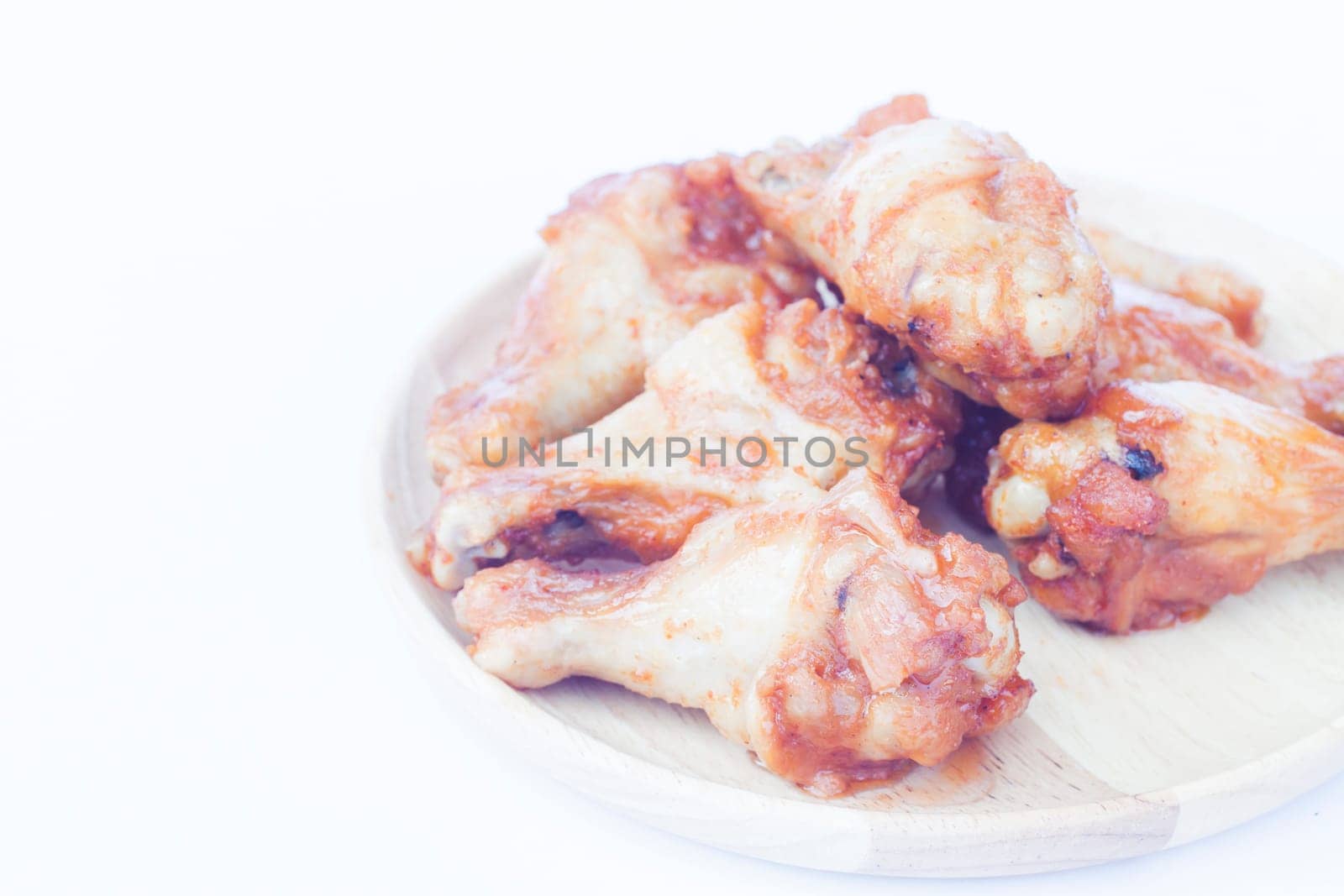 Grilled chicken wings isolated on white background, stock photo