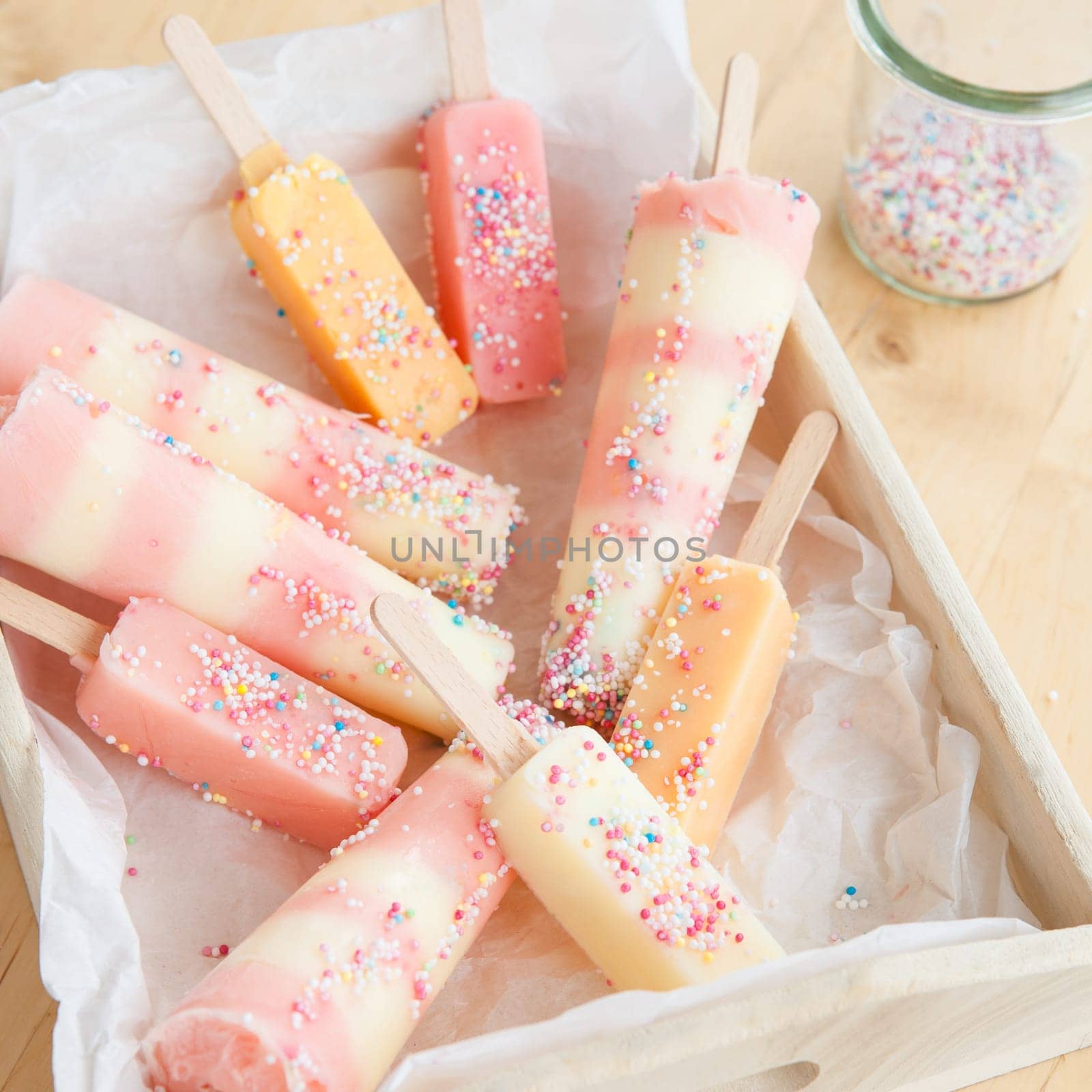 Colorful ice cream on the stem in different flavors