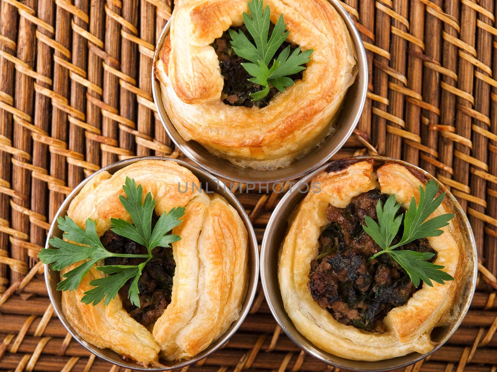 Puff pastry stuffed with ground beef, onion, cumin and other seasonings