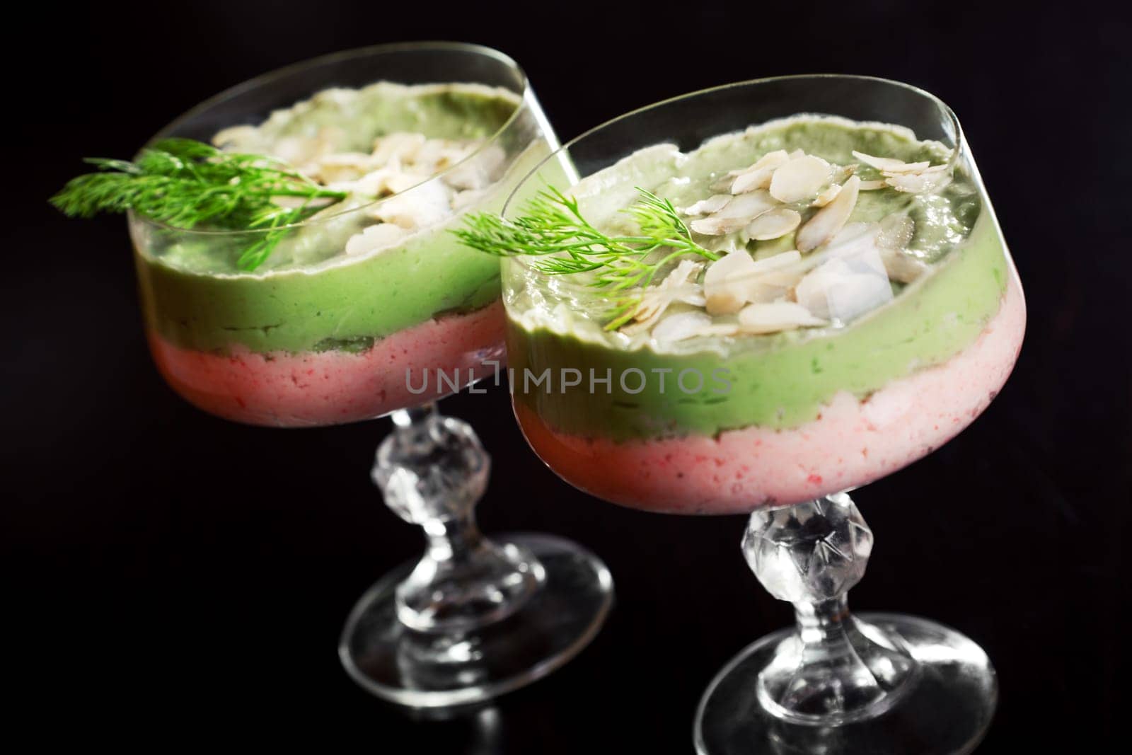 Crab mousse is made of crab meat or surimi, mascarpone, red bell pepper and garlic..Avocado mousse is made of avocados, mascarpone, green bell pepper, garlic, salt, lemon juice