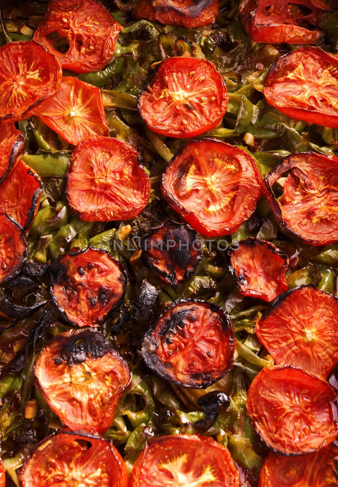 Iman Bayildi - the most popular turkish vegetarian dish made of braised eggplant, onion, peppers, garlic and tomatoes.