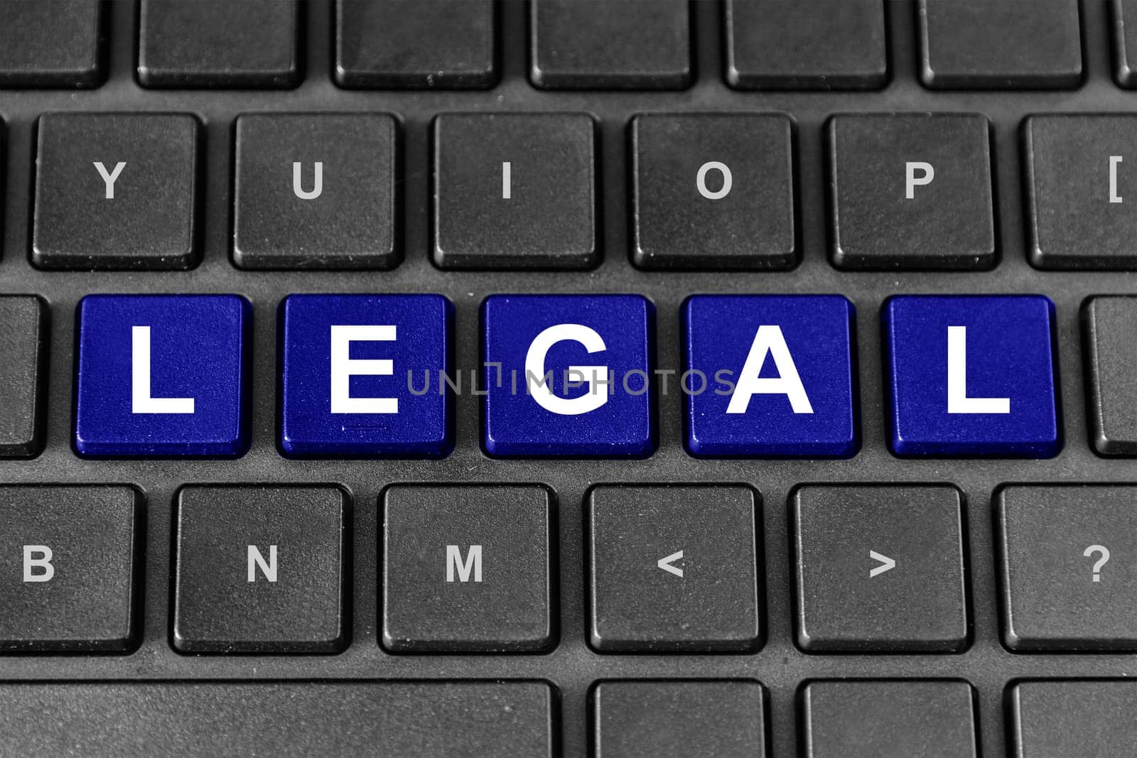 legal blue word on keyboard