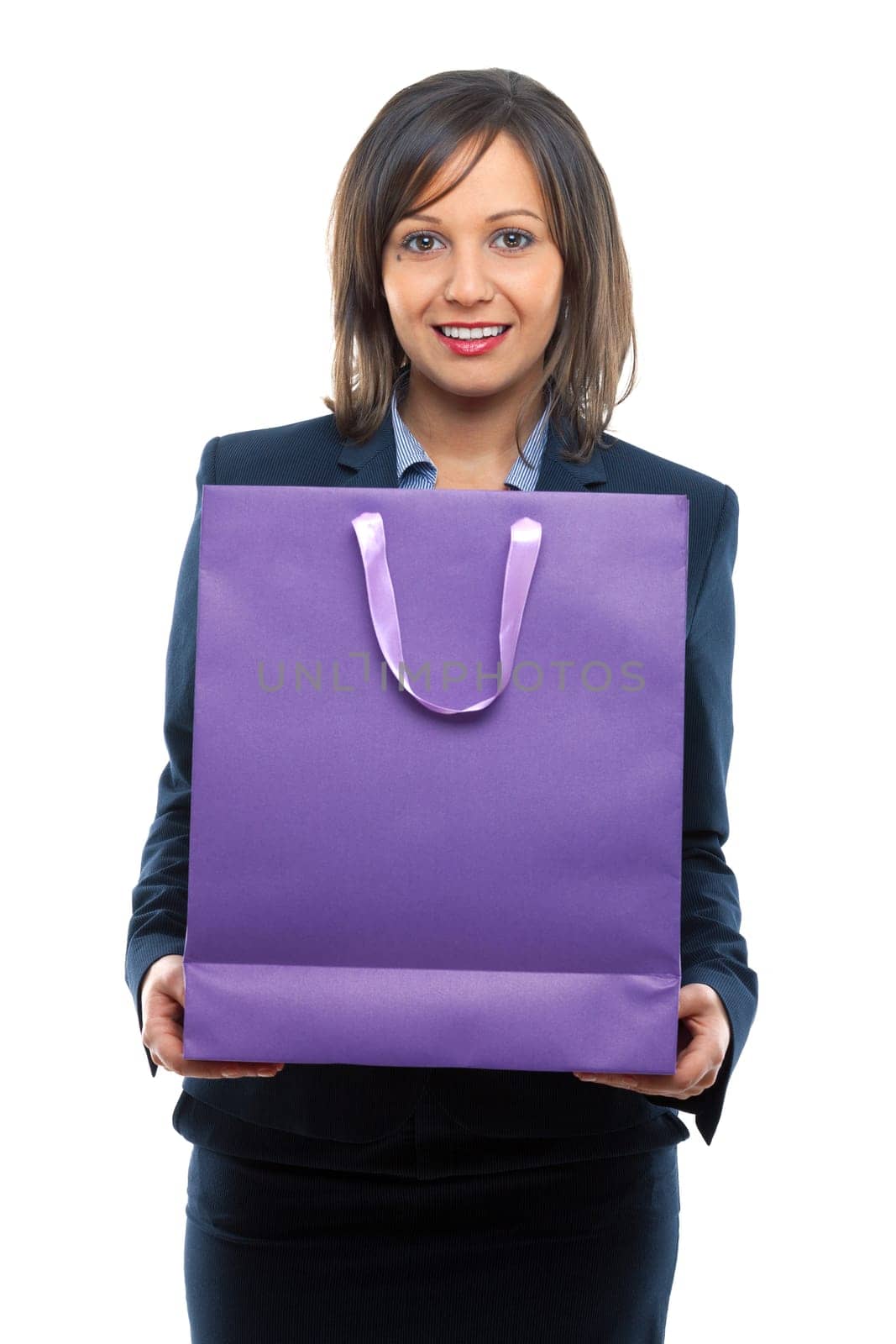 Businesswoman holding purple present isolated on white background