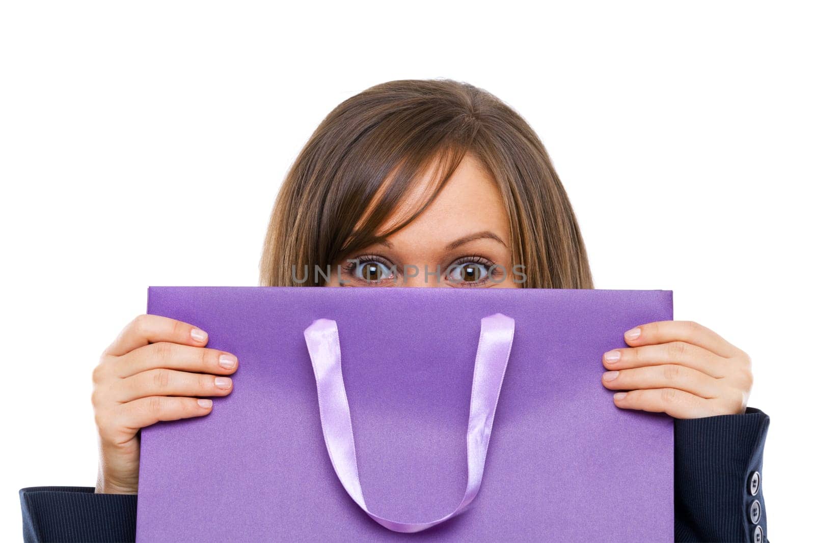 Businesswoman opening purple present with surprise isolated on white background