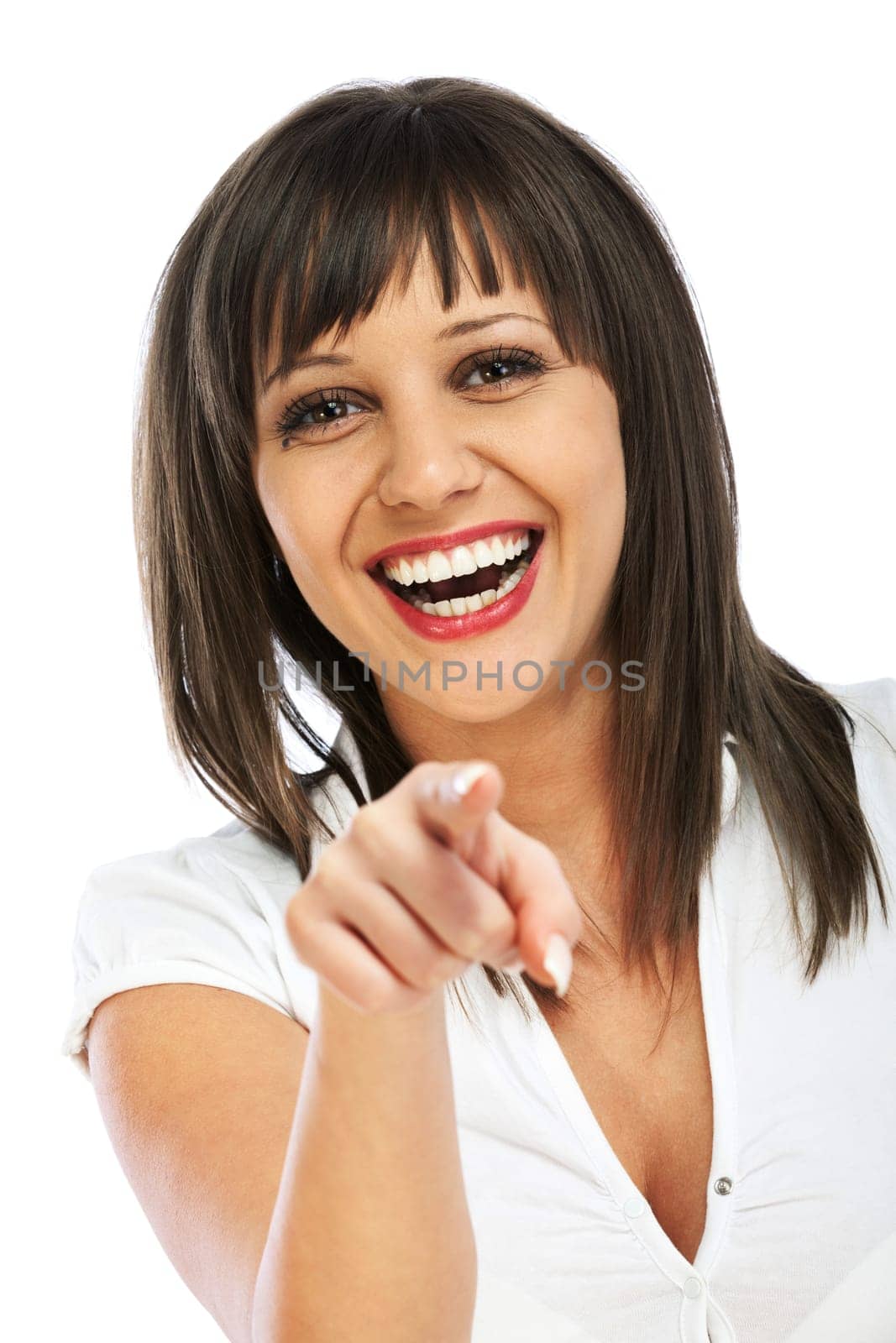 Cheerful caucasian woman pointing at camera, isolated on white background