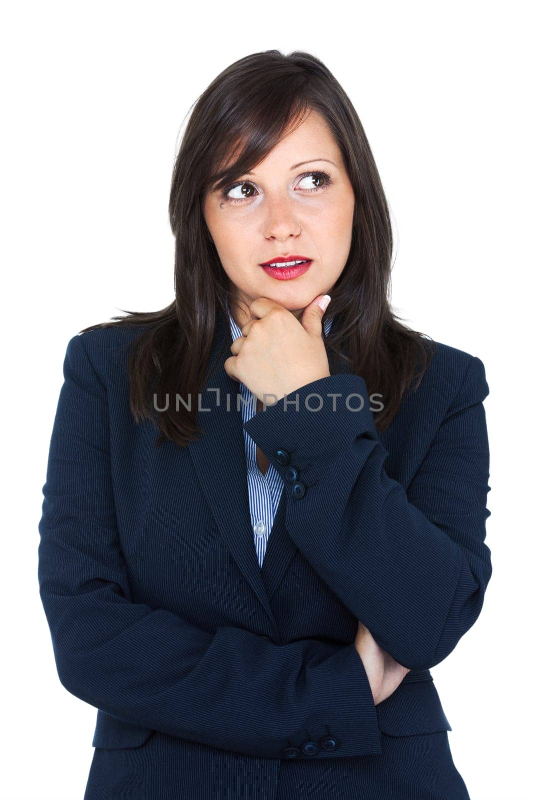 Young woman in a dark costume thinking, suitable to represent a business person or secretary, isolated on white