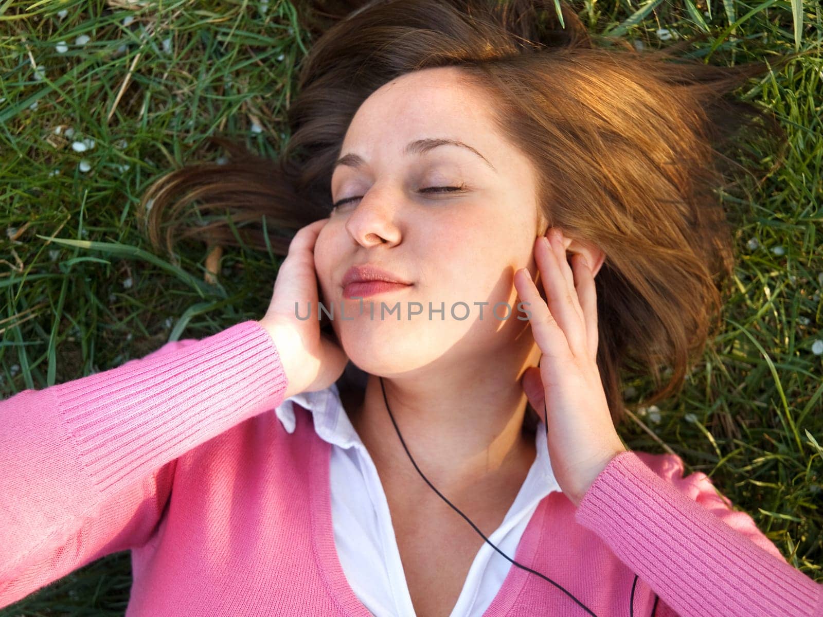 Woman lying on grass