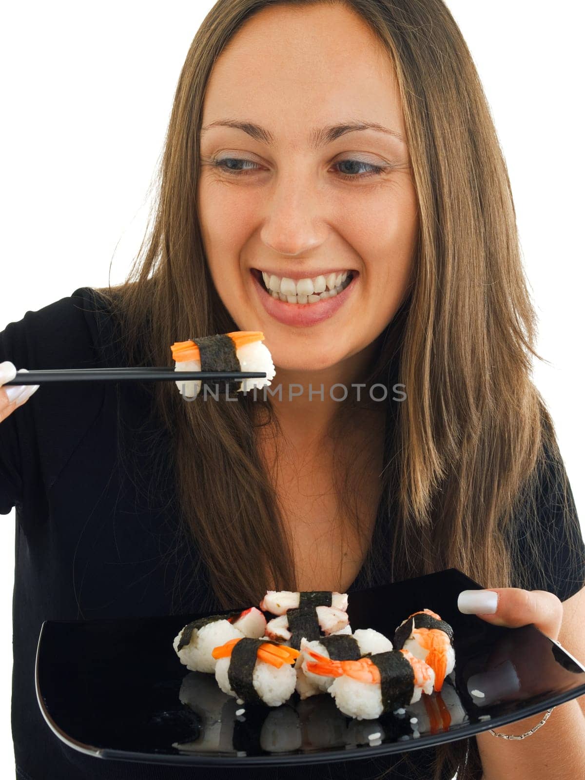 Woman eating sushi