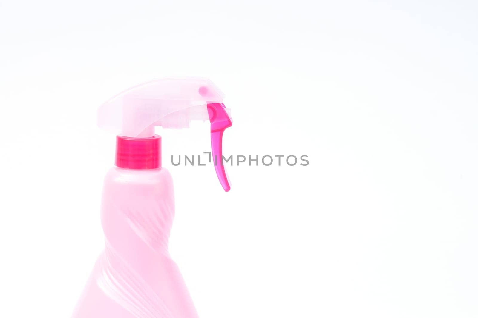Pink plastic foggy spray bottle isolated on white background, stock photo