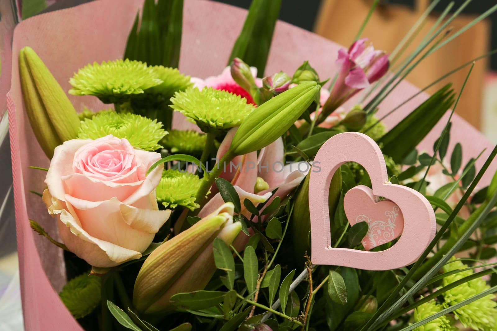 A beautiful flower bouquet with a romantic heart