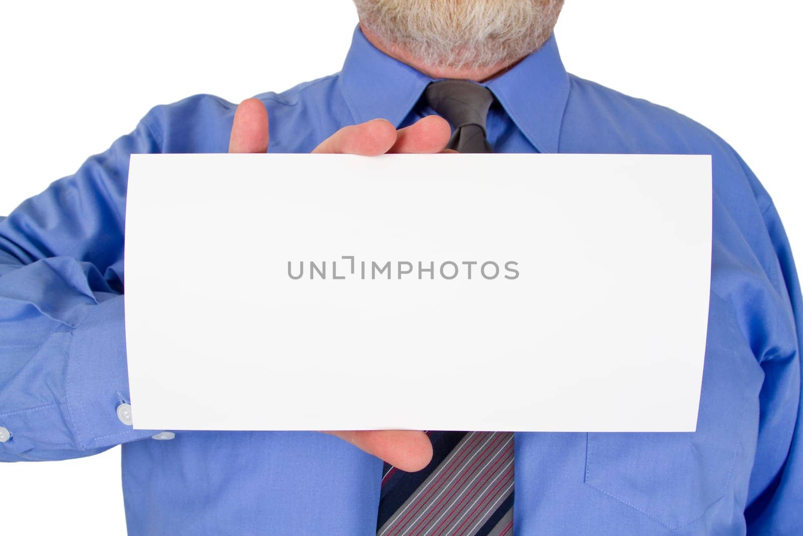Businessman holds white sheet of paper