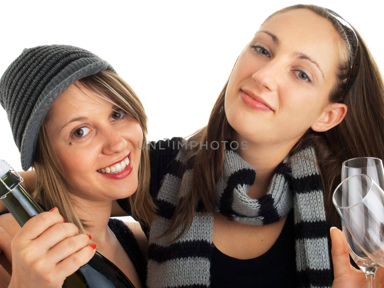 Two party girls with champagne and glasses, isolated on white