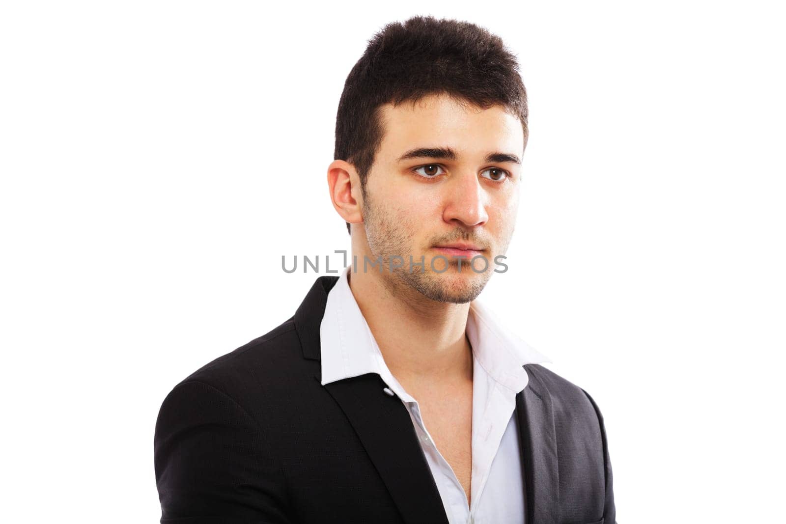 Young businessman looking away. Isolated on white background.