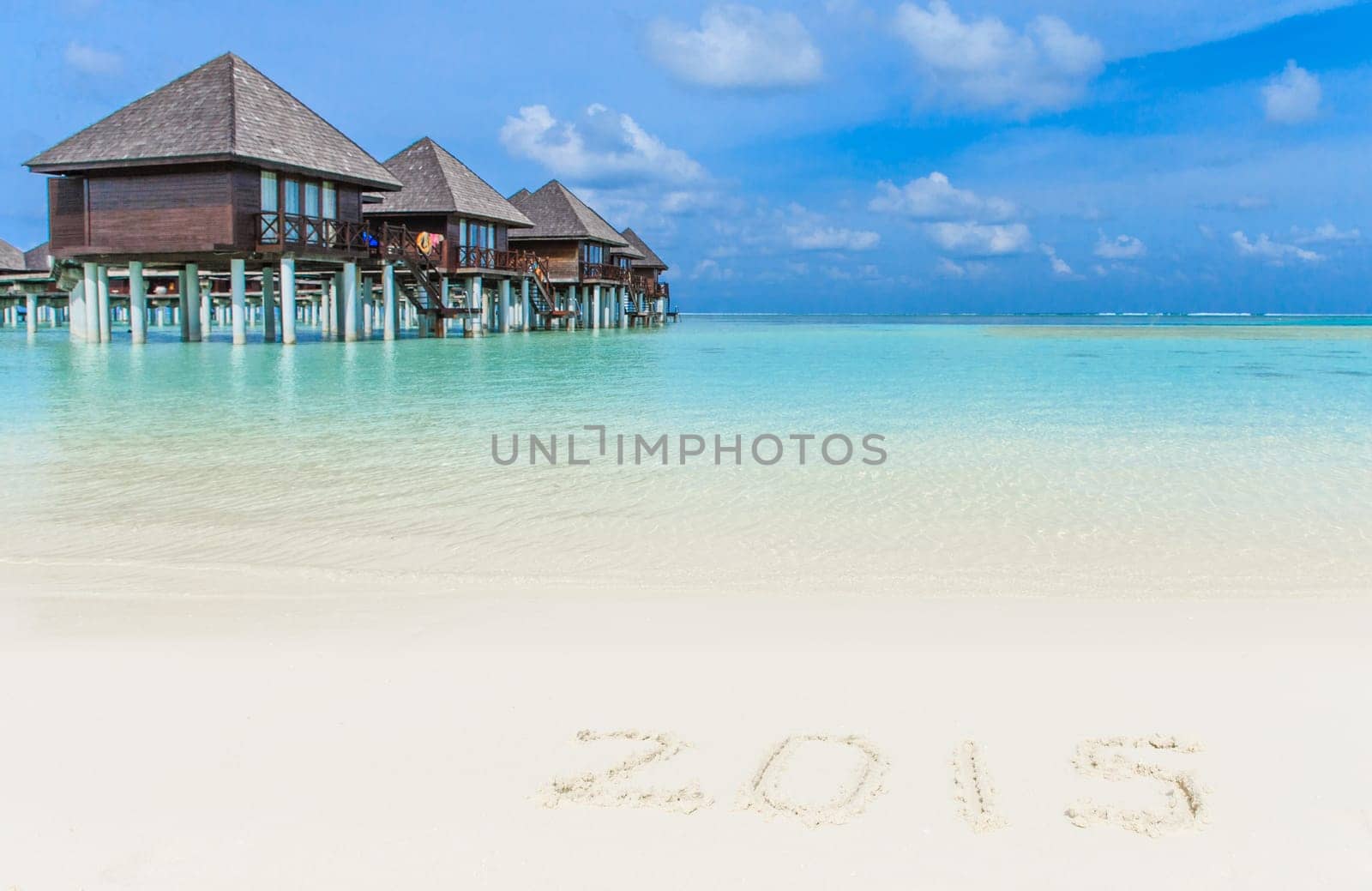 beach with water bungalows at Maldives