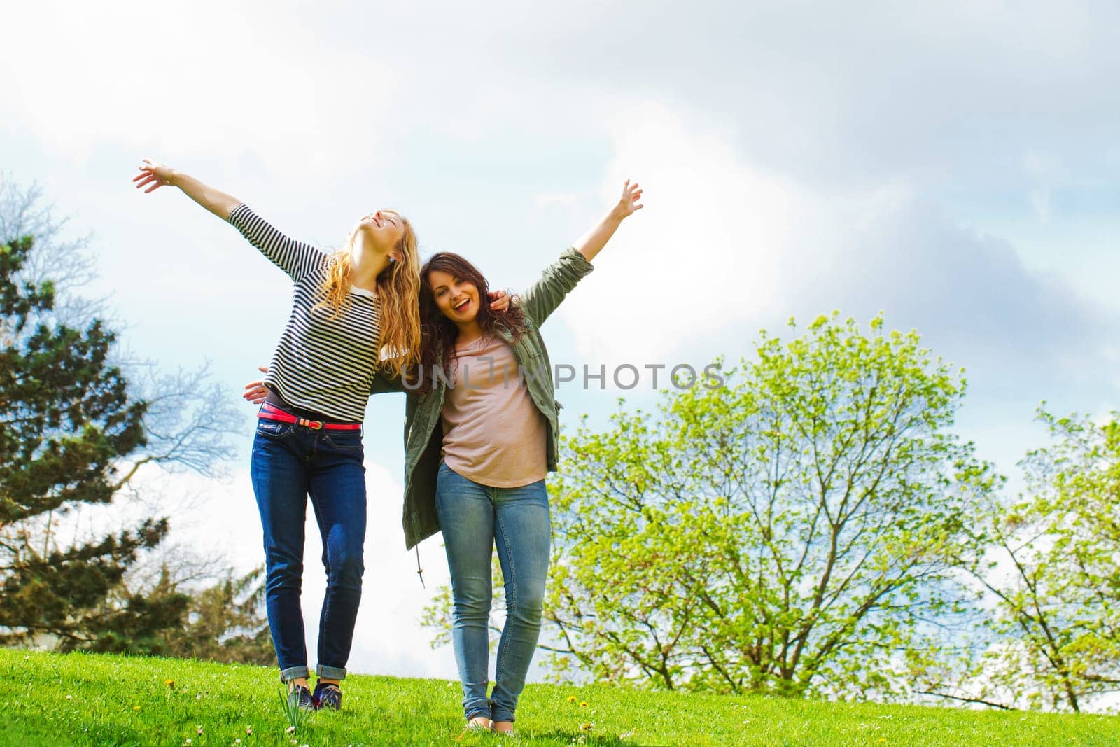 Girlfriends have fun in nature