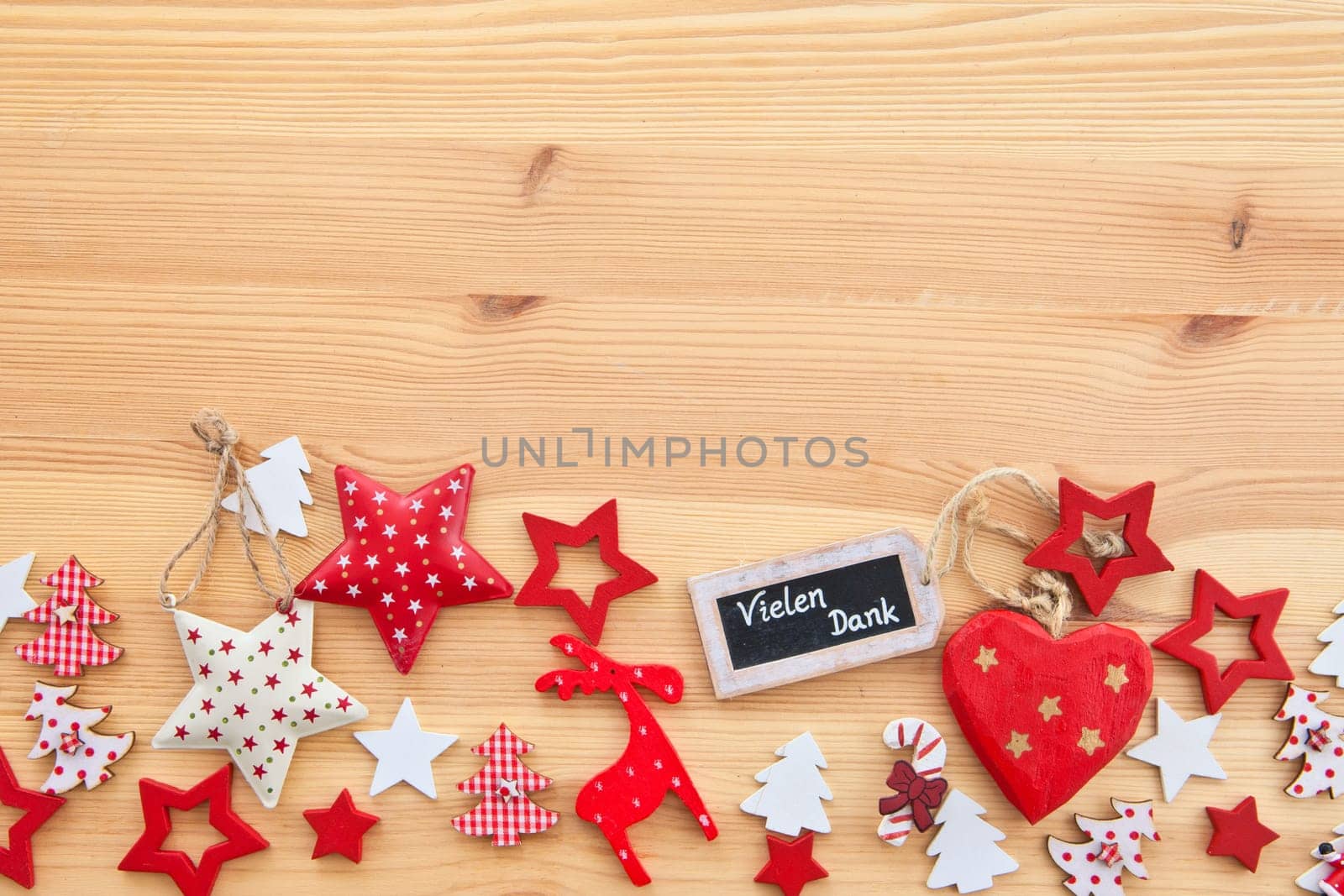 Rustic wooden background with colorful decorations for Christmas