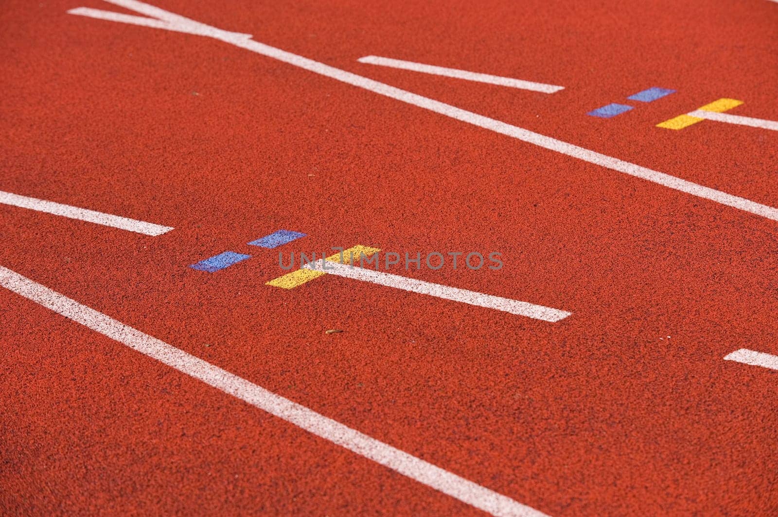 Finish line and numbers on red running track