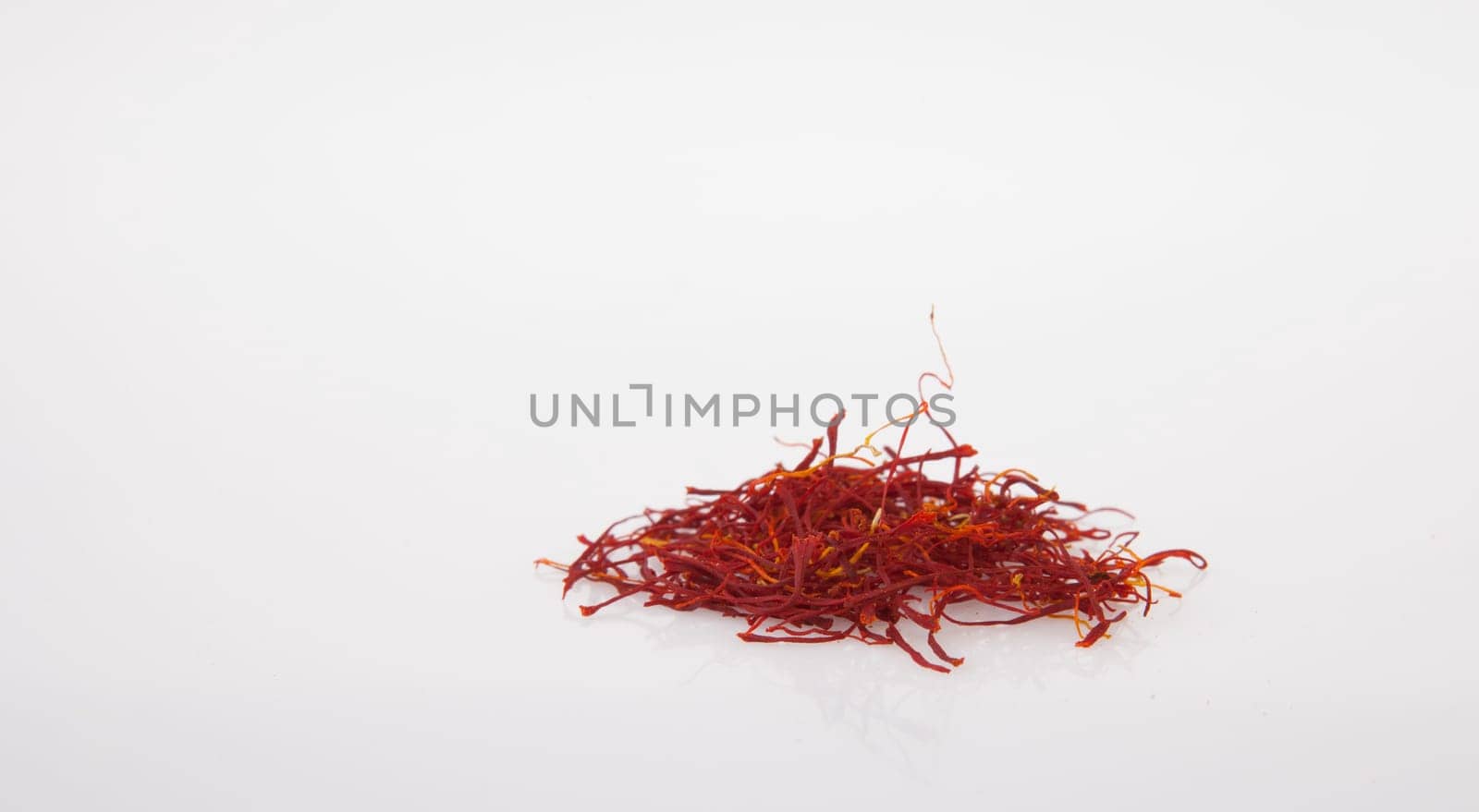 Handful of Spanish Saffron Isolated on white background