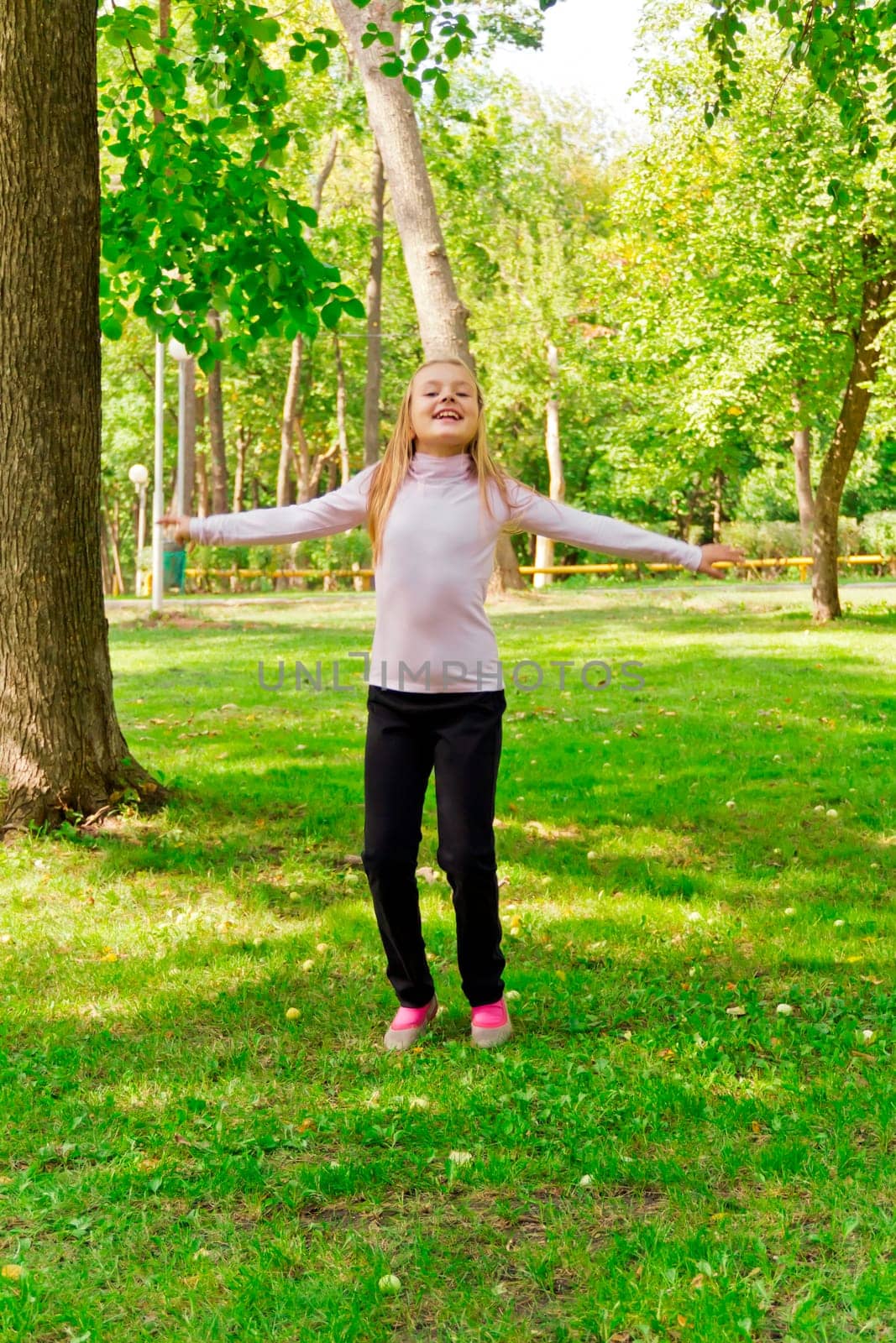 Photo of cute jumping girl in summer