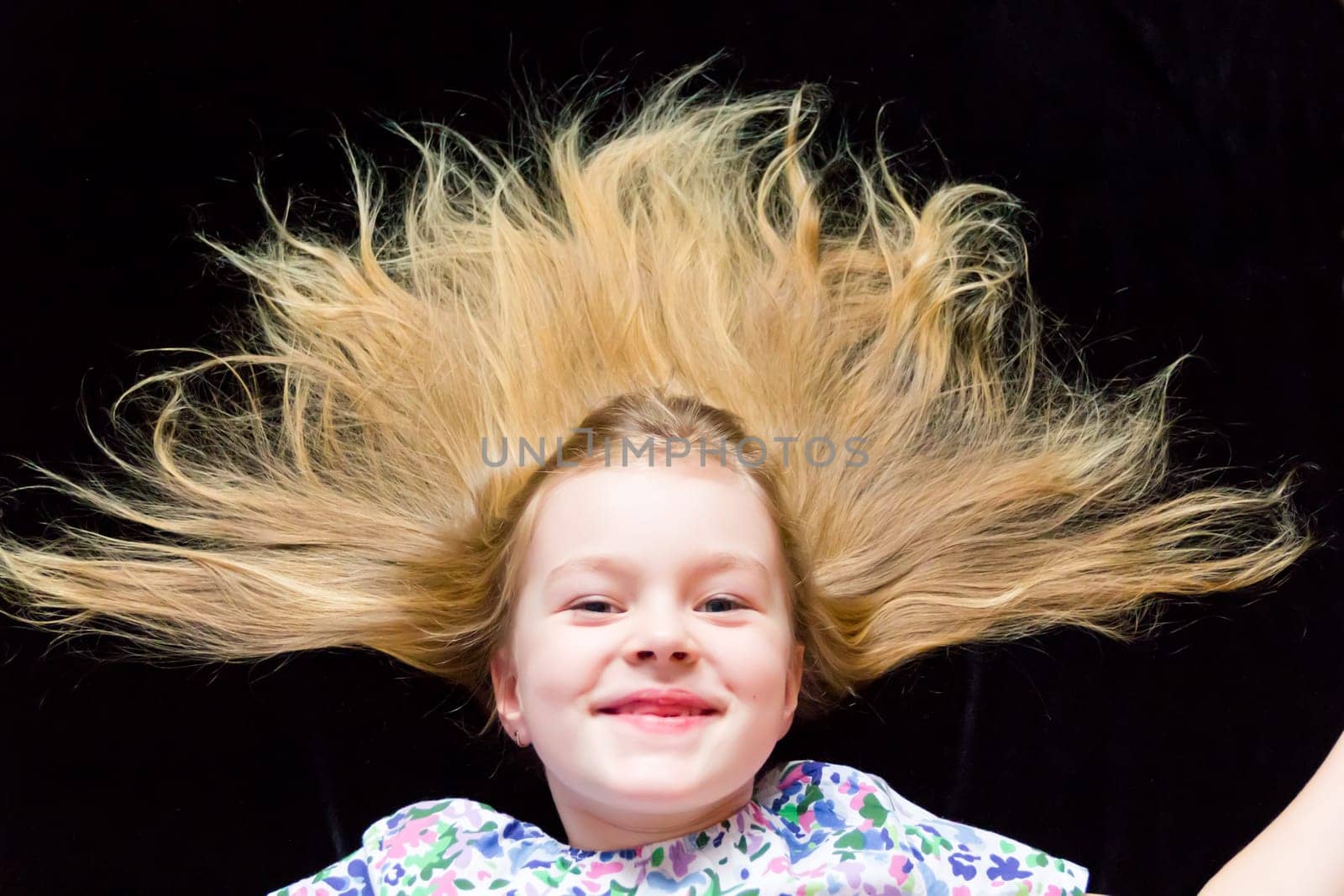 Cute beautiful girl makes faces imitate witch