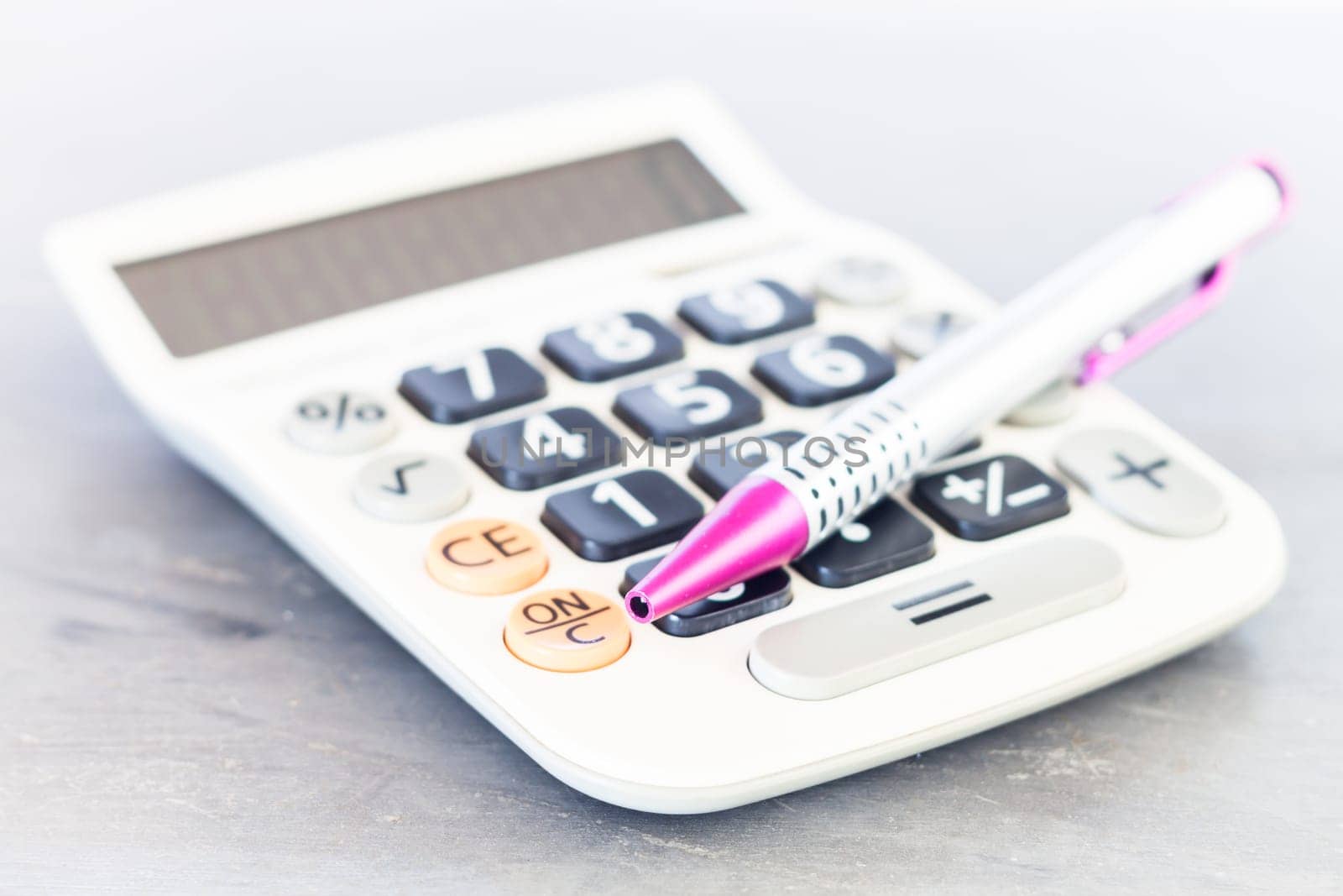 Close up calculator with pen, stock photo