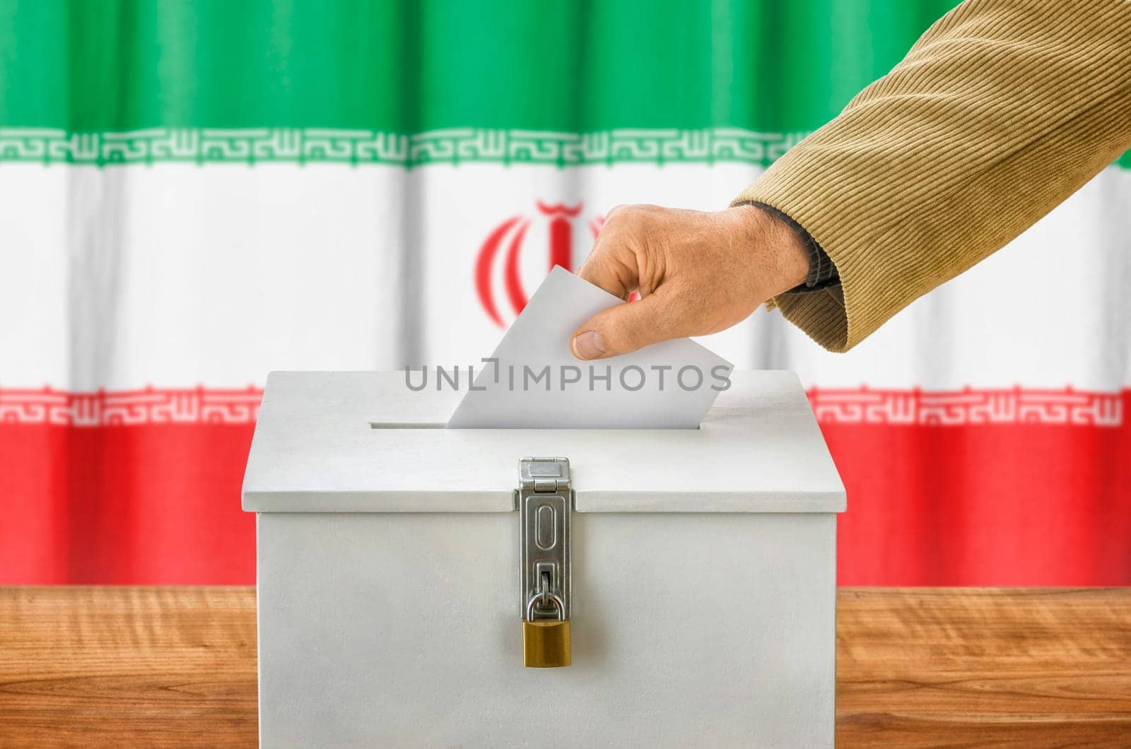 Man throws ballot papers into ballot box - Iran