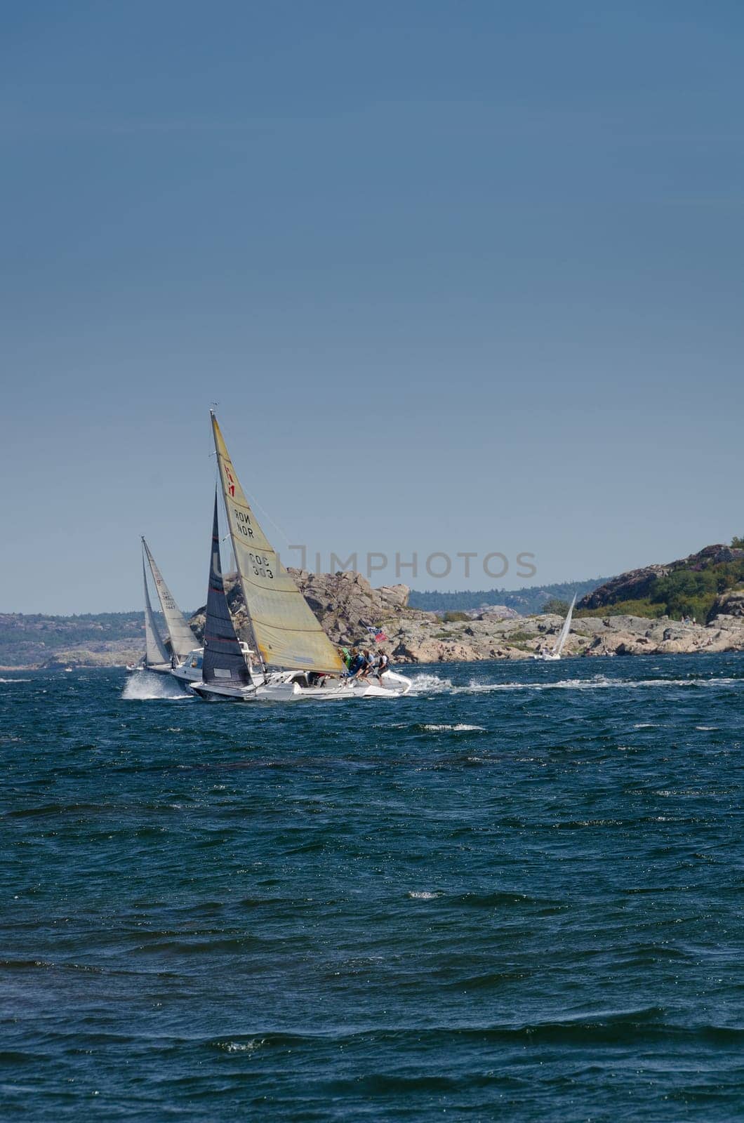 sailboat in one competition in sweden round one island in westcoast