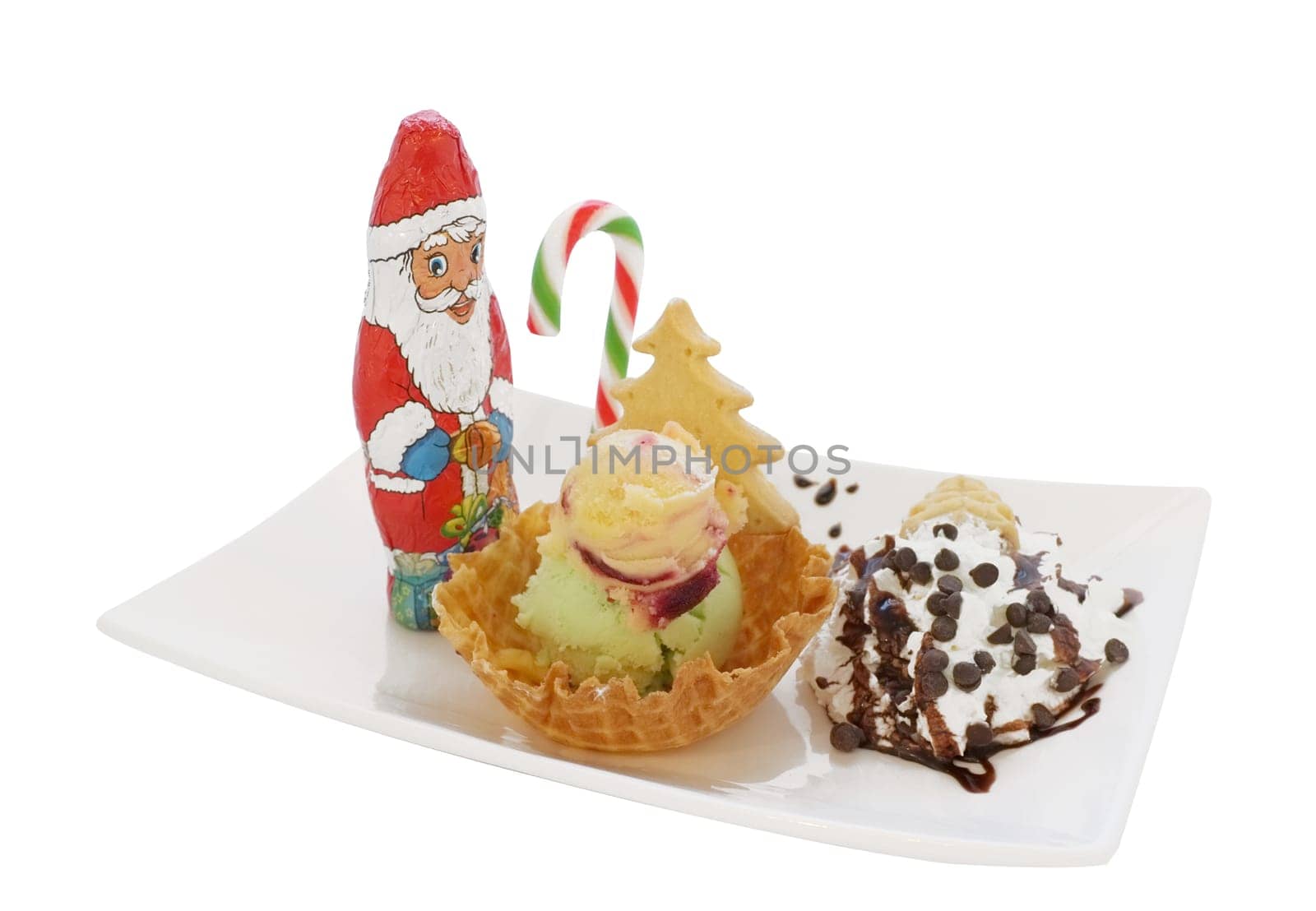 Ice cream in wafer cone / bowl with christmas decoration isolated on white background