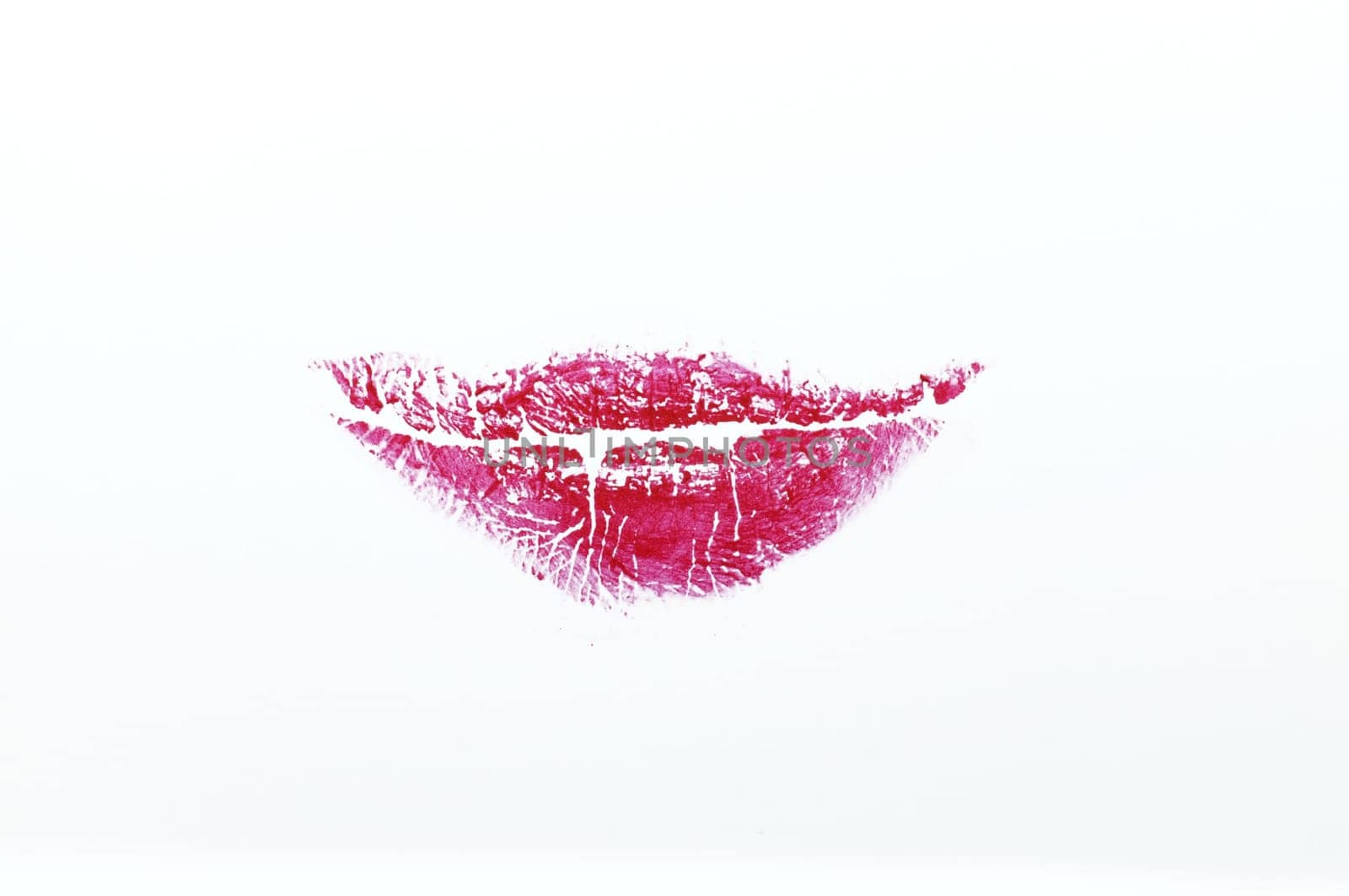 Red lipstick on white background