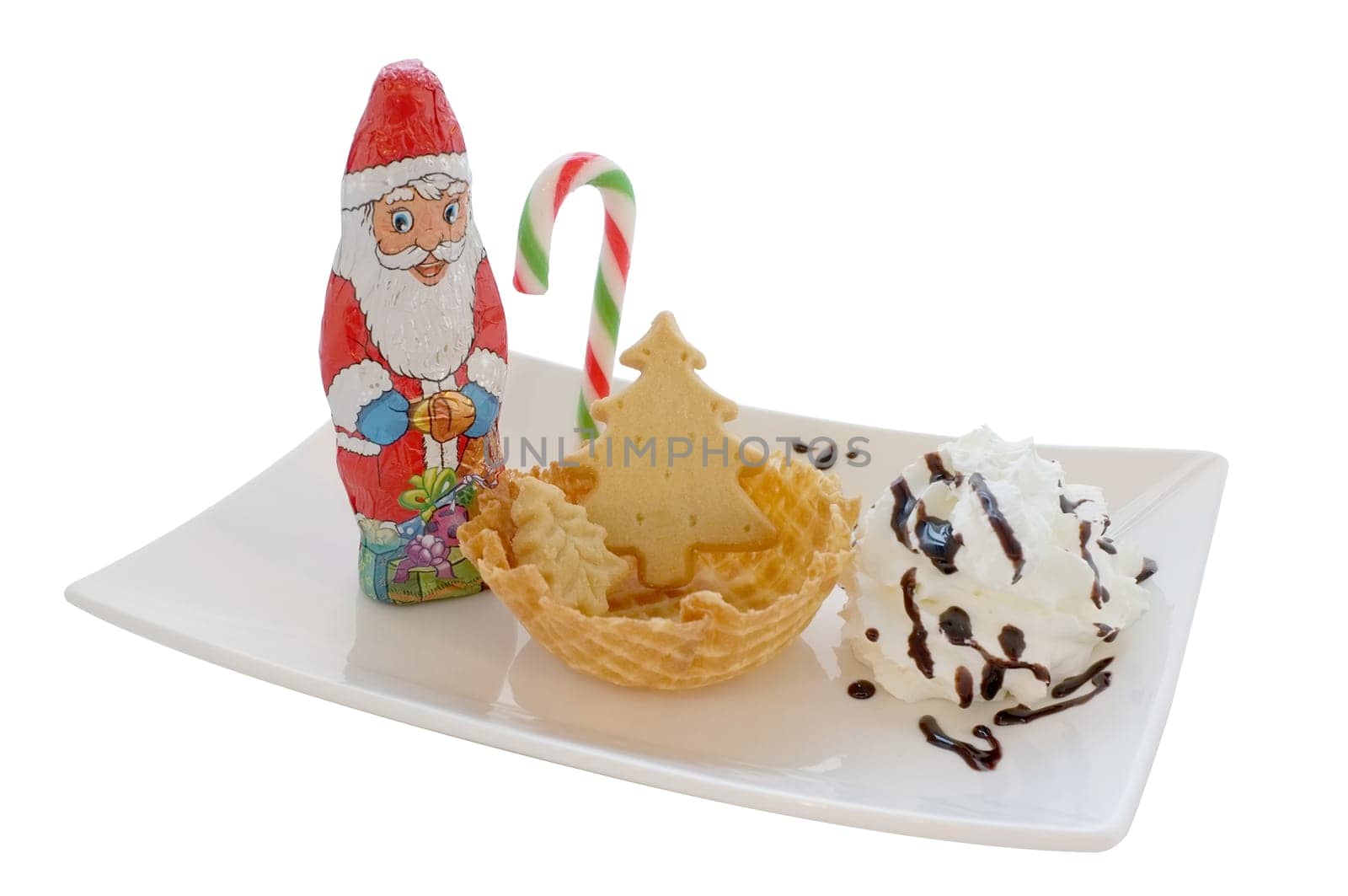 Ice cream in wafer cone / bowl with christmas decoration isolated on white background