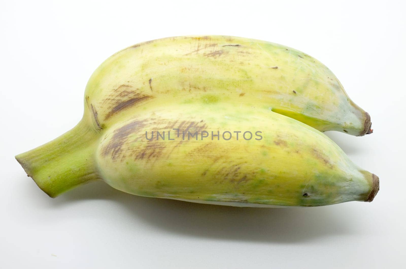 Two / Twins cultivated banana on white background