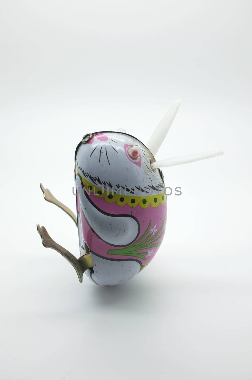 Wind-up vintage toy rabbit isolated on white background